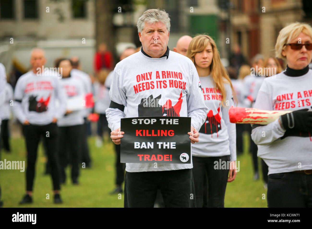 London, UK. 7th Oct, 2017. A silent protest in Parliament Square by GMFER, to focus on bringing awareness and adding pressure to the UK government to bring in a full ban on ivory, and to highlight the antiques industry which so shamefully fights to keep the ivory trade alive. Penelope Barritt/Alamy Live News Stock Photo