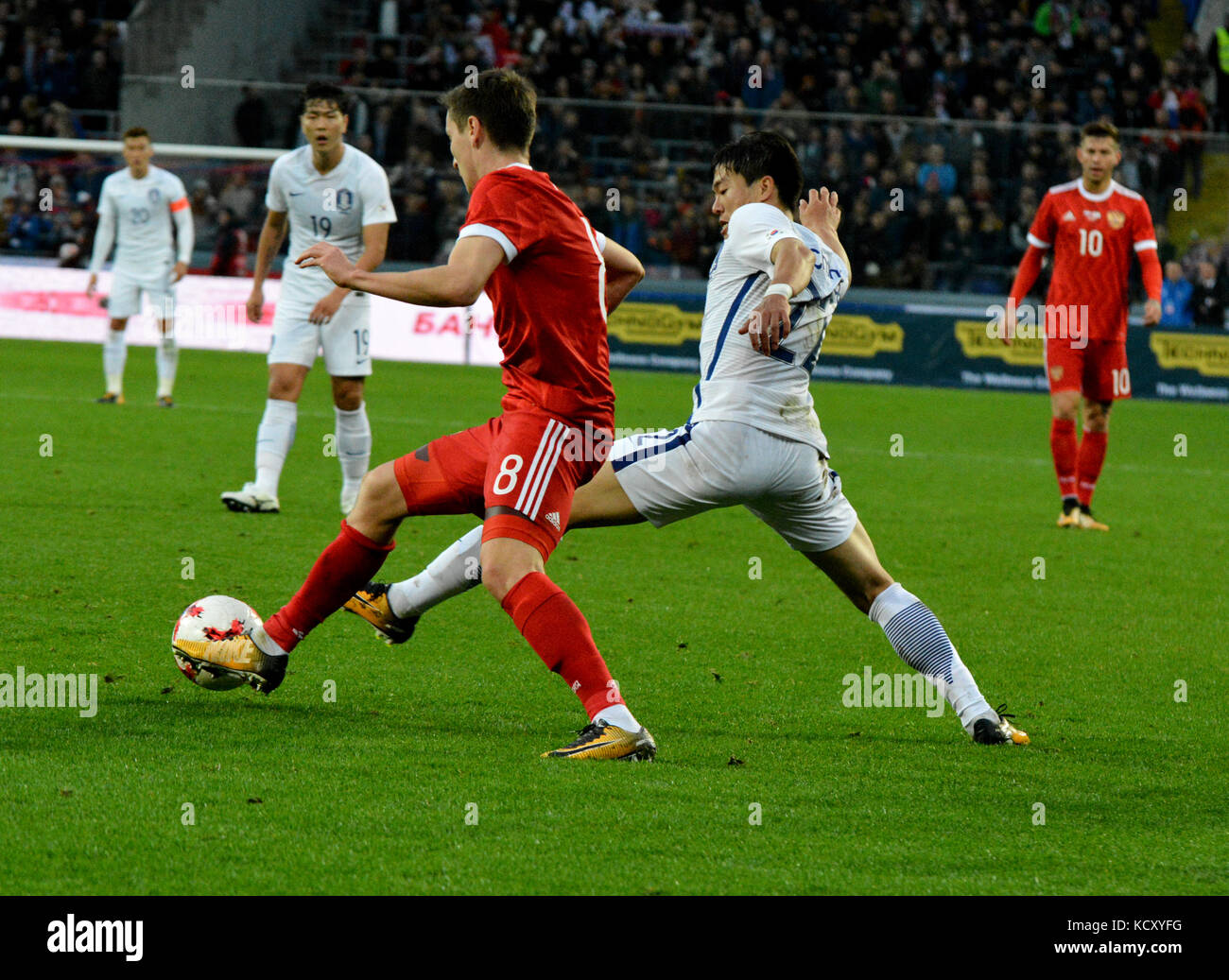 Moscow, Russia - October 7, 2017. Russian midfielder Daler Kuzyayev and South Korean defender Chang-Hoon Kwon during international friendly match Russia vs South Korea at VEB Arena stadium in Moscow. Credit: Alizada Studios/Alamy Live News Stock Photo