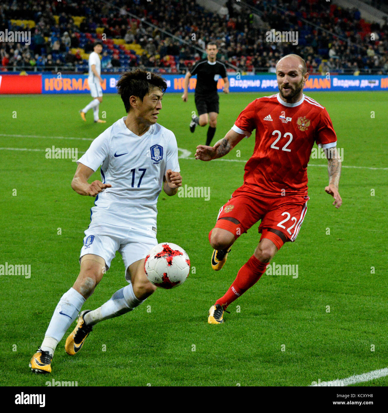 Moscow, Russia - October 7, 2017. Russian midfielder Konstantin Rausch and South Korean winger Chung-Yong Lee during international friendly match Russia vs South Korea at VEB Arena stadium in Moscow. Credit: Alizada Studios/Alamy Live News Stock Photo