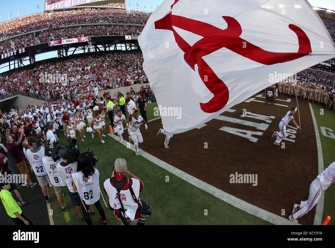 October 6, 2017: The Alabama Crimson Tide take the field at the start of the NCAA football game between the Alabama Crimson Tide and the Texas A&M Aggies at Kyle Field in College Station, TX; John Glaser/CSM. Stock Photo