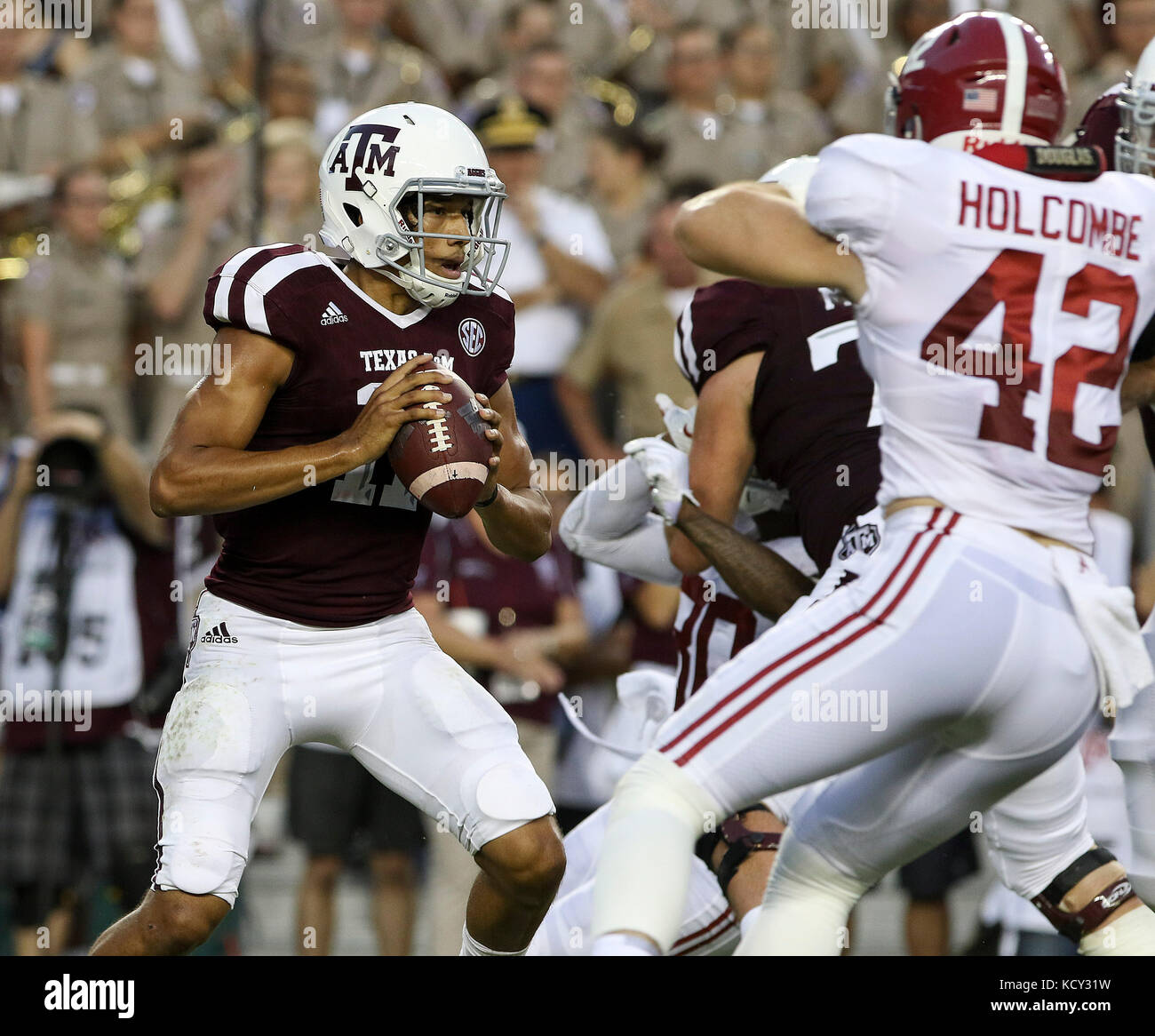 October 6, 2017: Texas A&M Aggies quarterback Kellen Mond (11) drops back to pass in the first quarter during the NCAA football game between the Alabama Crimson Tide and the Texas A&M Aggies at Kyle Field in College Station, TX; John Glaser/CSM. Stock Photo