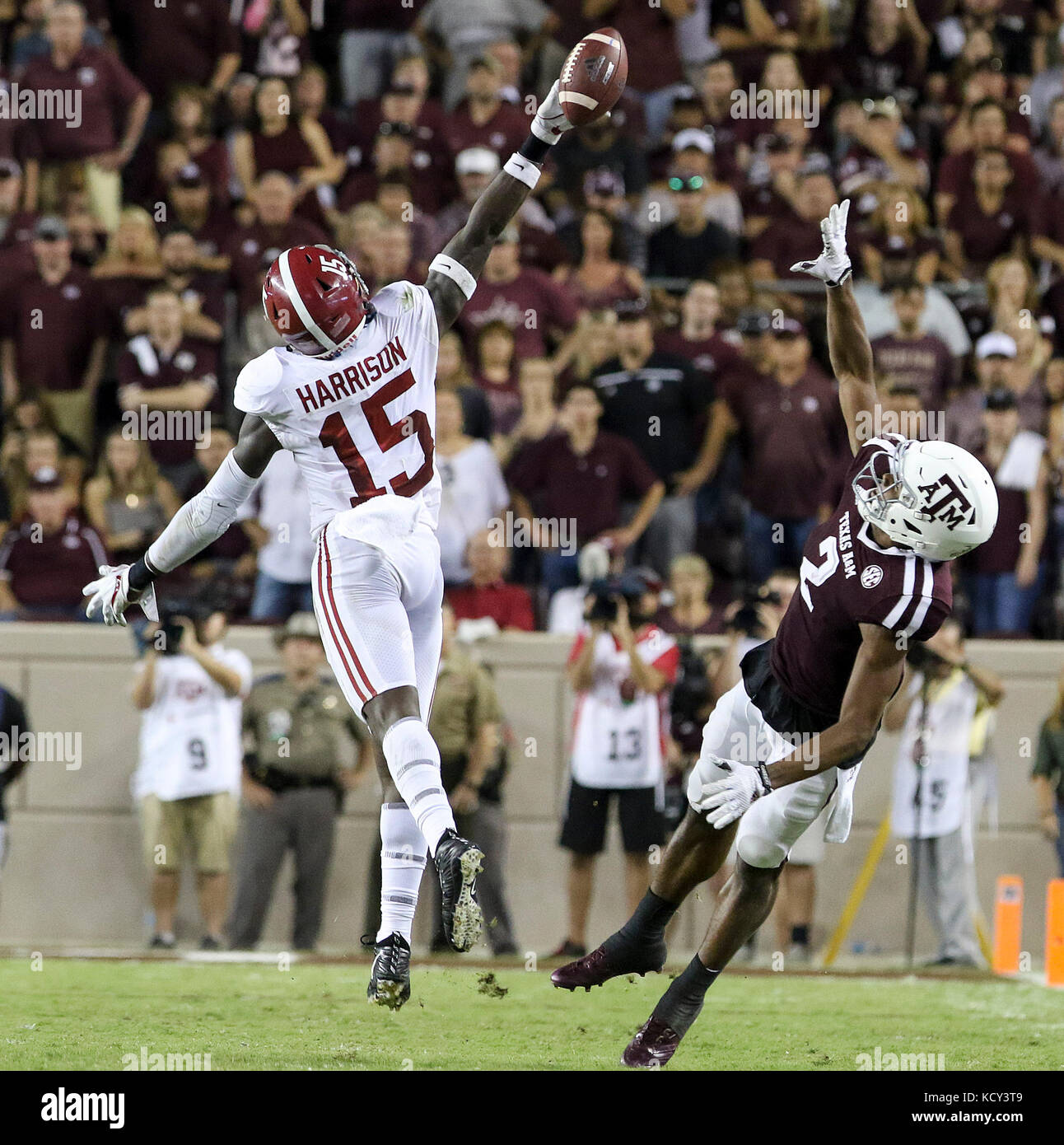 October 6, 2017: Alabama Crimson Tide defensive back Ronnie Harrison (15) tips a pass intended for Texas A&M Aggies wide receiver Jhamon Ausbon (2) in the fourth quarter during the NCAA football game between the Alabama Crimson Tide and the Texas A&M Aggies at Kyle Field in College Station, TX; John Glaser/CSM. Stock Photo