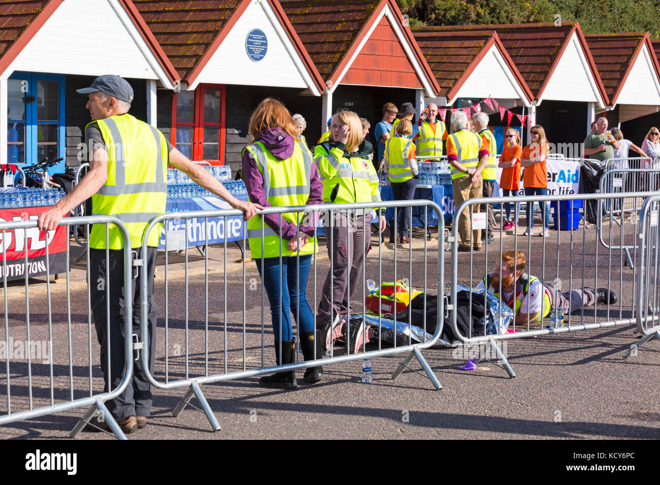 Bournemouth, Dorset, UK. 8th Oct, 2017. The final day of the Bournemouth Marathon Festival gets underway with the marathon and half marathon. Half marathon runners as the weather gets warmer and sunnier and temperatures rise. Medical attention needed for runner on the ground. Credit: Carolyn Jenkins/Alamy Live News Stock Photo