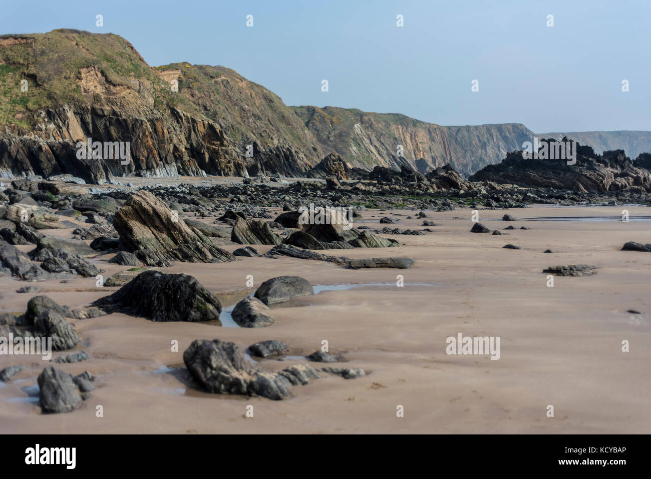 Sandy Rocks Clif's A sandy beach with rocks and cliffs, Pembrokeshire , UK Stock Photo - Alamy