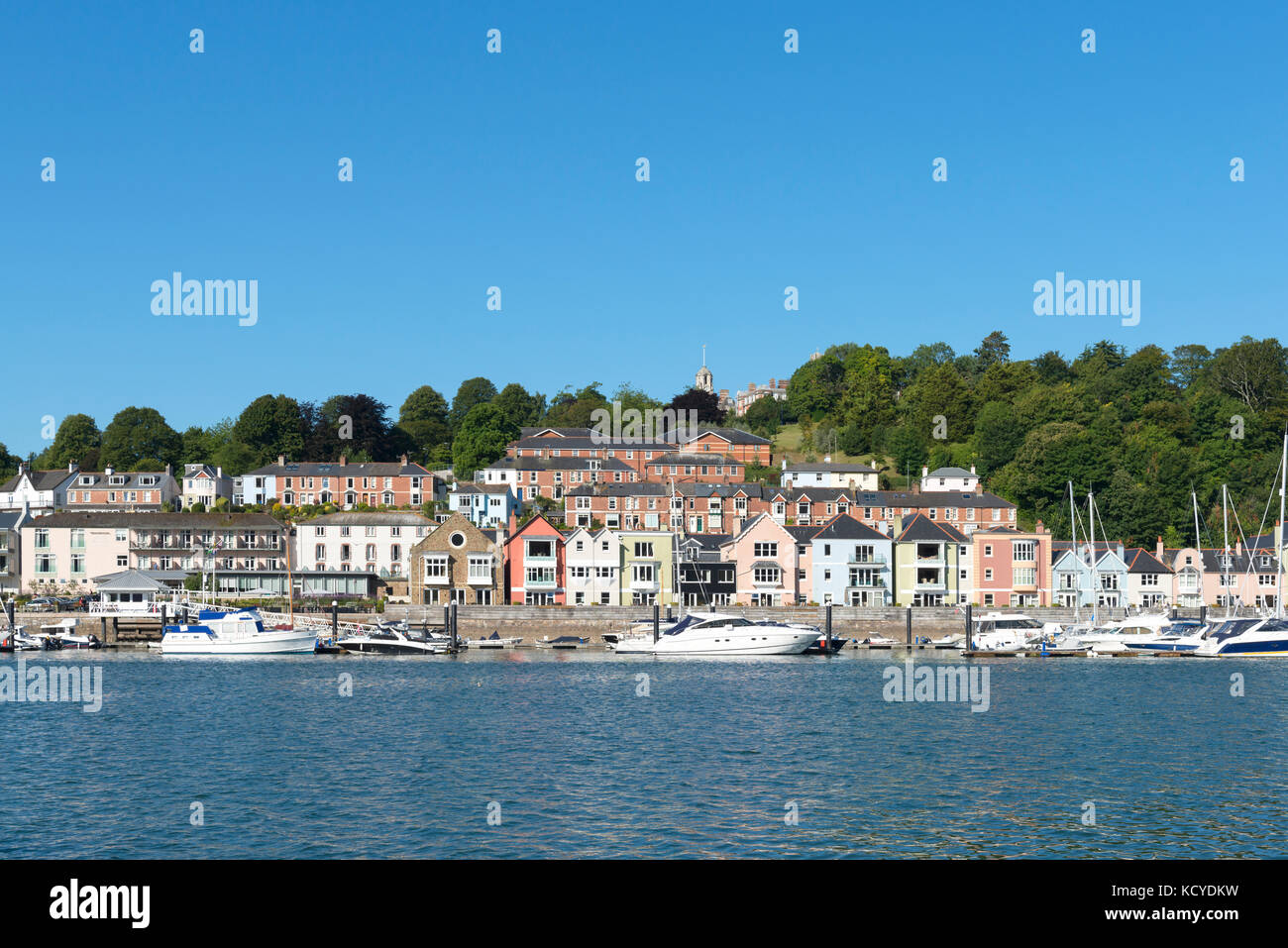 From the River Dart, Dartmouth, Devon - Dart Marina and Hotel with yachts and pleasure craft on water, hotel and buildings, trees and hills. Summer Stock Photo