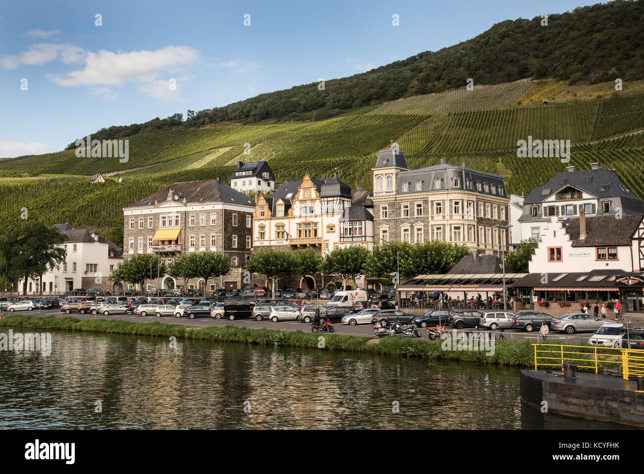 The town of Bernkastel-Kues, in the Mosel Valley, Germany. Photographed from the river boat. Showing the river cruiser Europa. Stock Photo