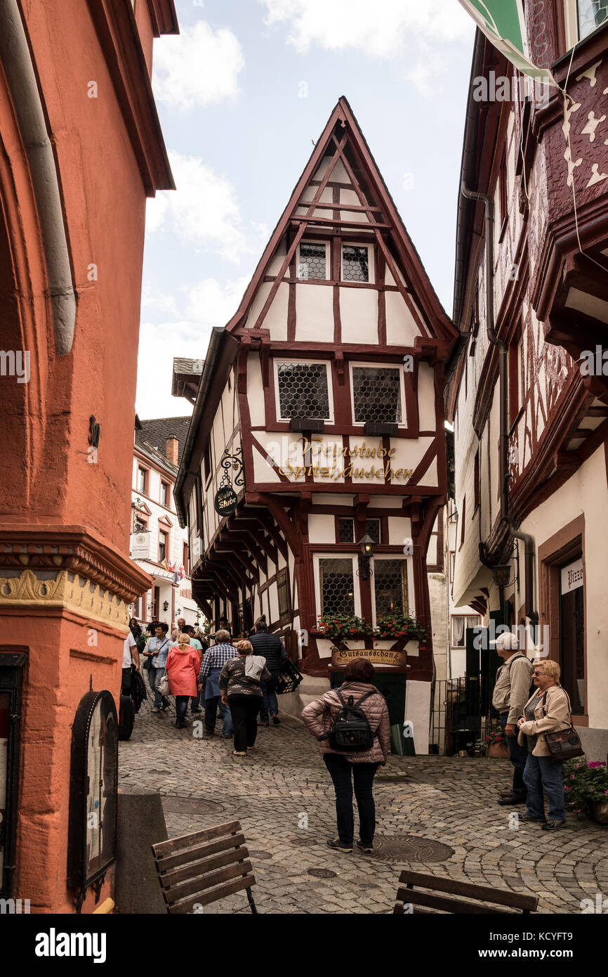 The narrow streets and half timbered buildings in the town of Bernkastel-Kues, in the Mosel Valley, Germany Germany. Shows a falling over house Stock Photo