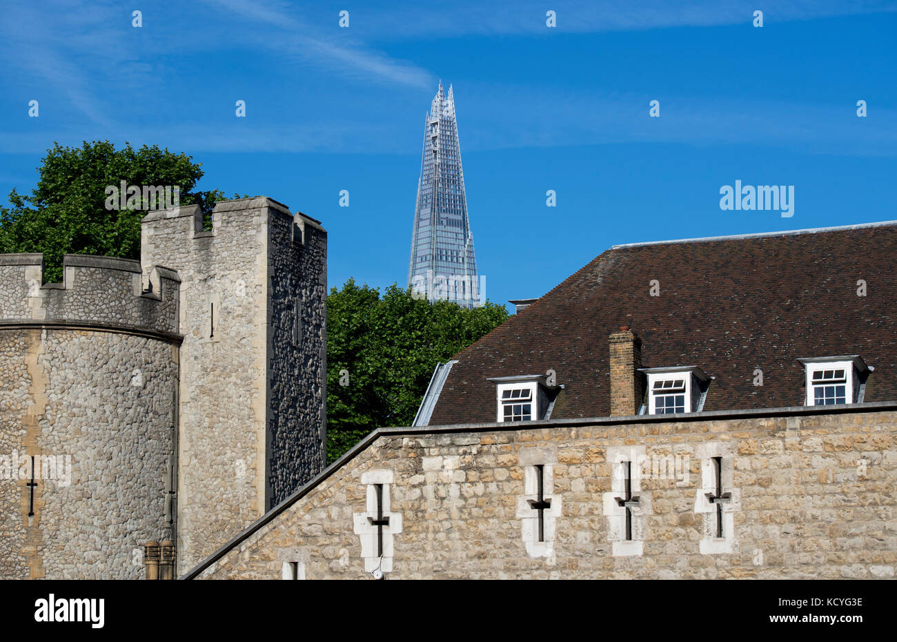 Walls of the Tower of London in London, England, UK, with the Shard in the background Stock Photo