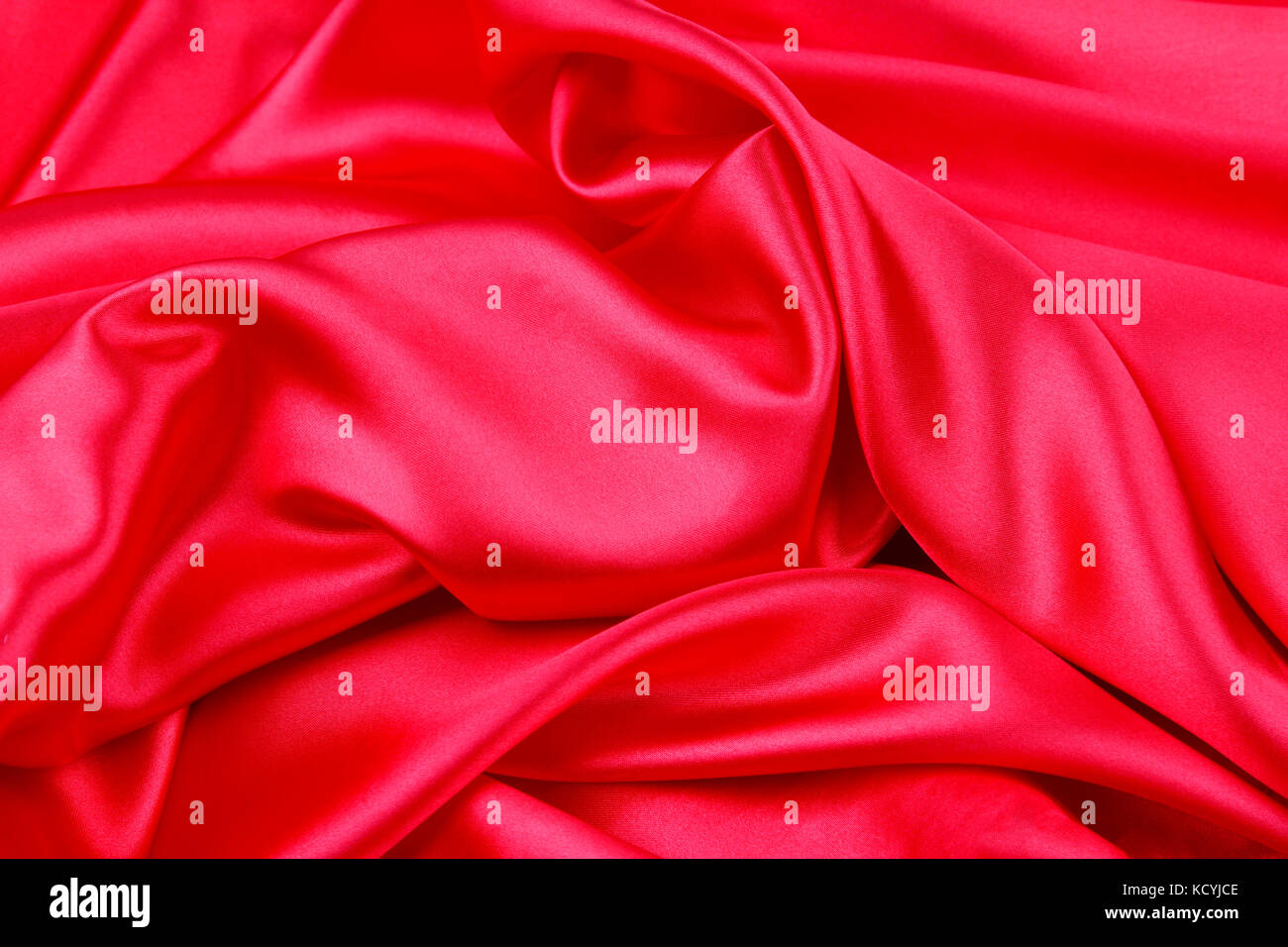 Closeup of ripples in red silk fabric Stock Photo - Alamy