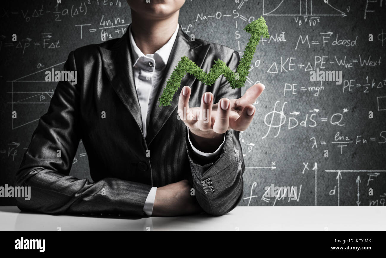 Businessman presenting growing graph Stock Photo - Alamy