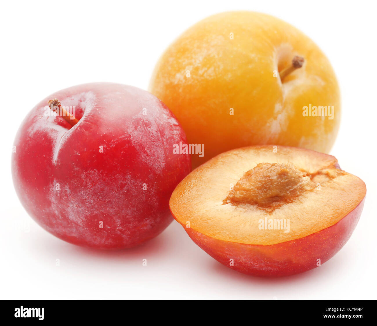 Fresh plums over white background Stock Photo Alamy