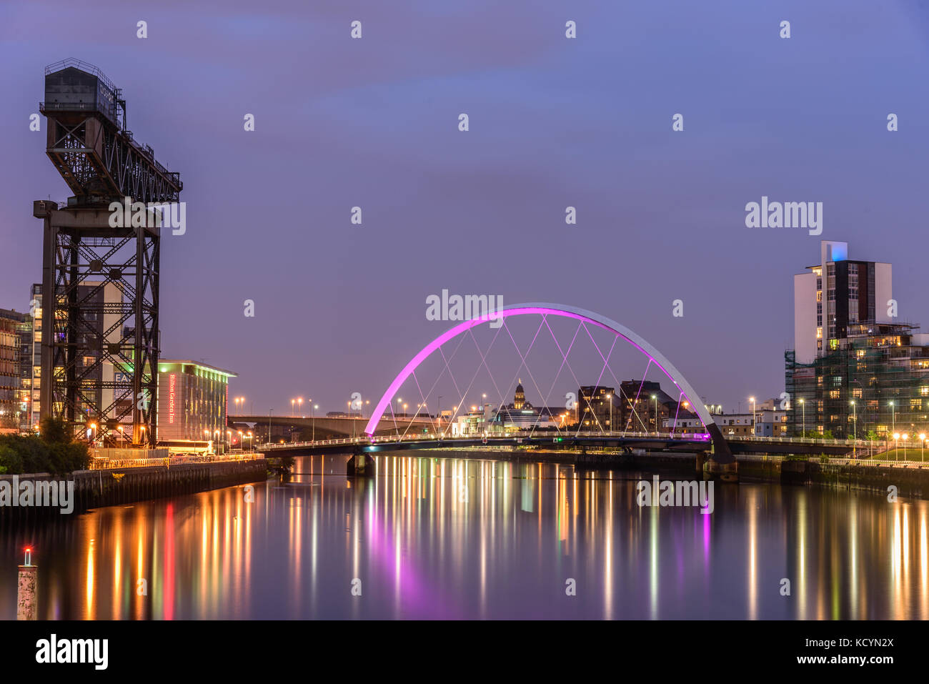 GLASGOW, SCOTLAND - AUGUST 15, 2017 - Night lights and the Clyde Arc Bridge at Glasgow City in Scotland over river. Stock Photo