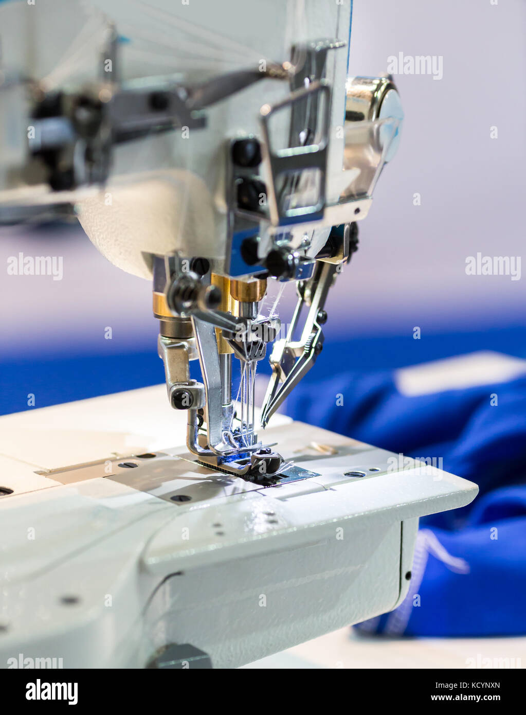 Sewing machine closeup, nobody, dressmaker equipment, cloth industry ...