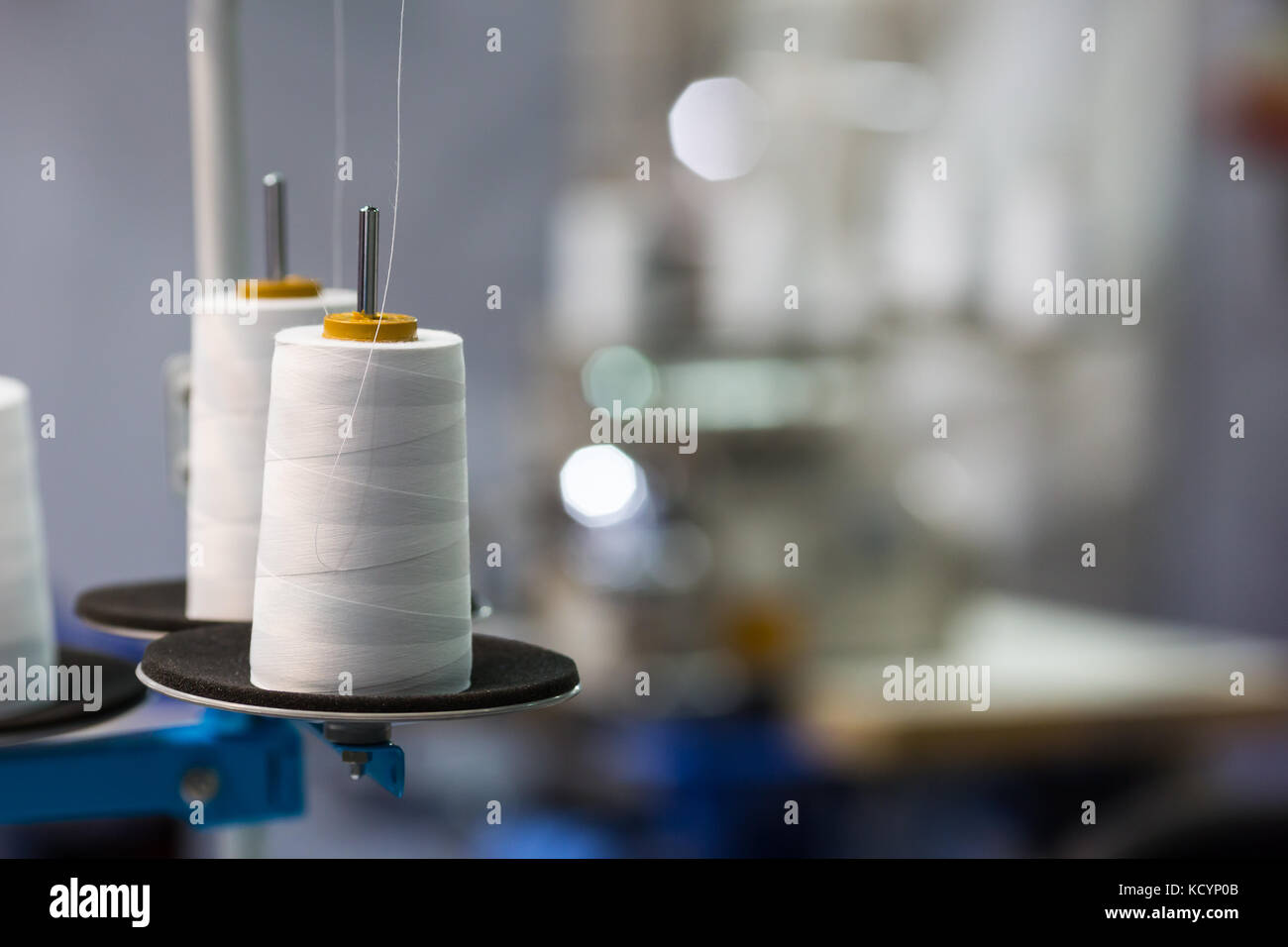 Thread spools spinning on sewing hi-res stock photography and images ...