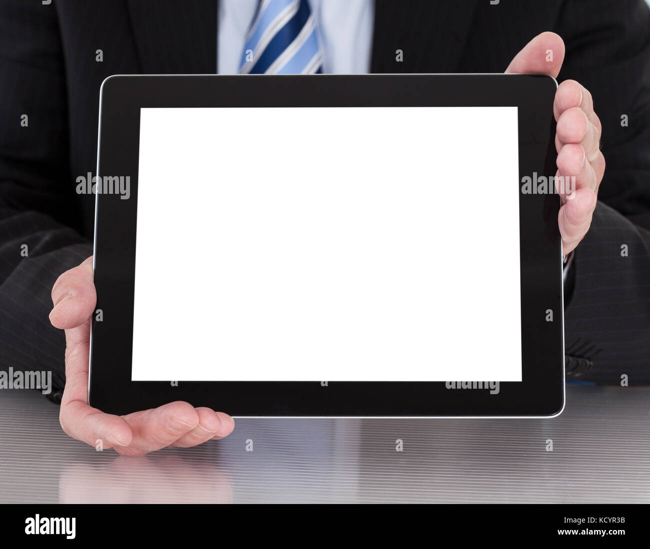 Close-up Of Mature Businessman Holding Digital Tablet Stock Photo - Alamy