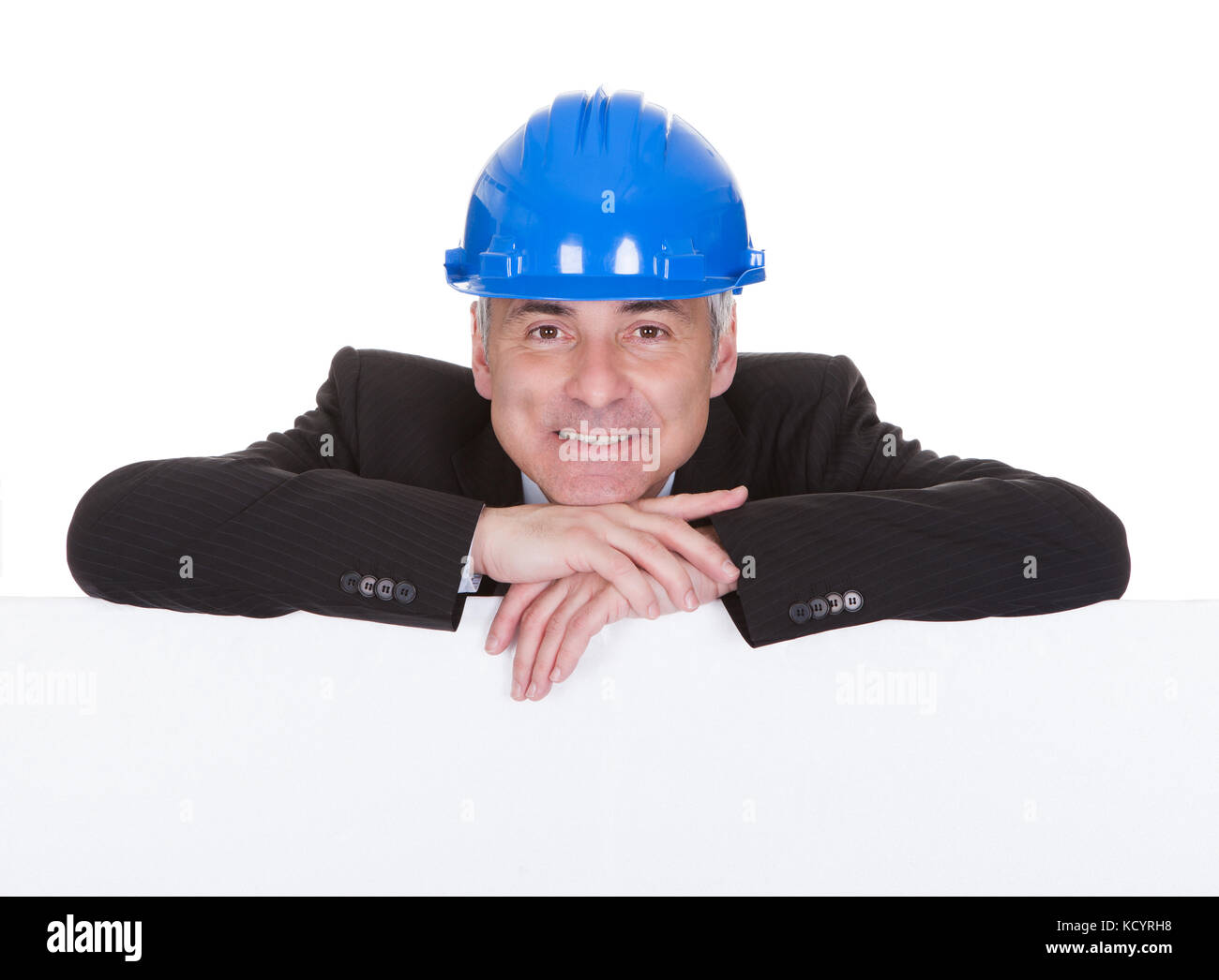 Mature Male Architect Holding Billboard Over White Background Stock Photo