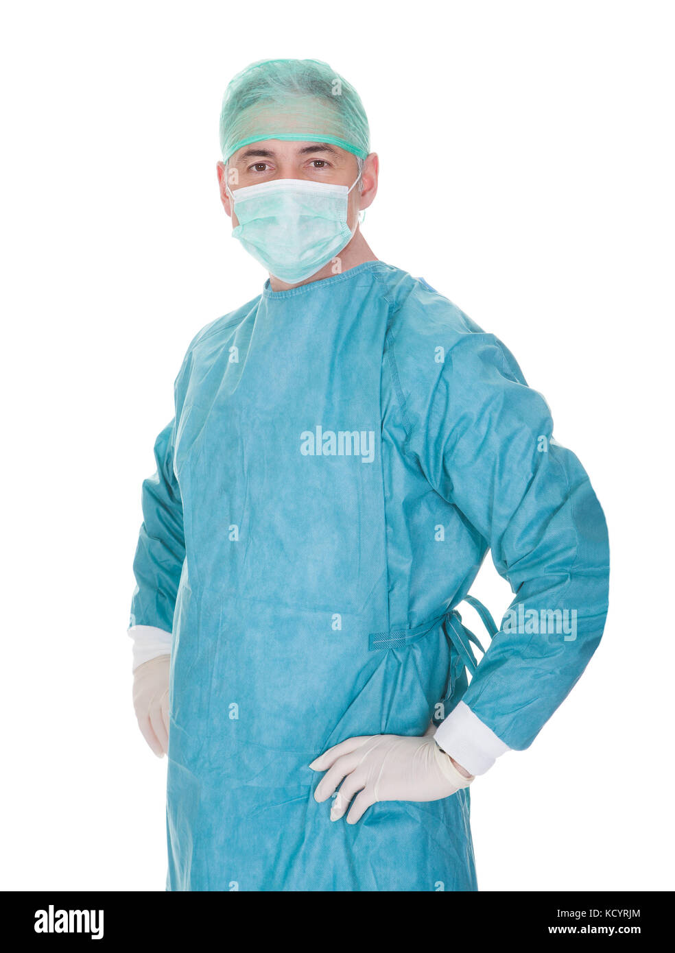 Portrait Of Mature Male Surgeon Isolated Over White Background Stock Photo