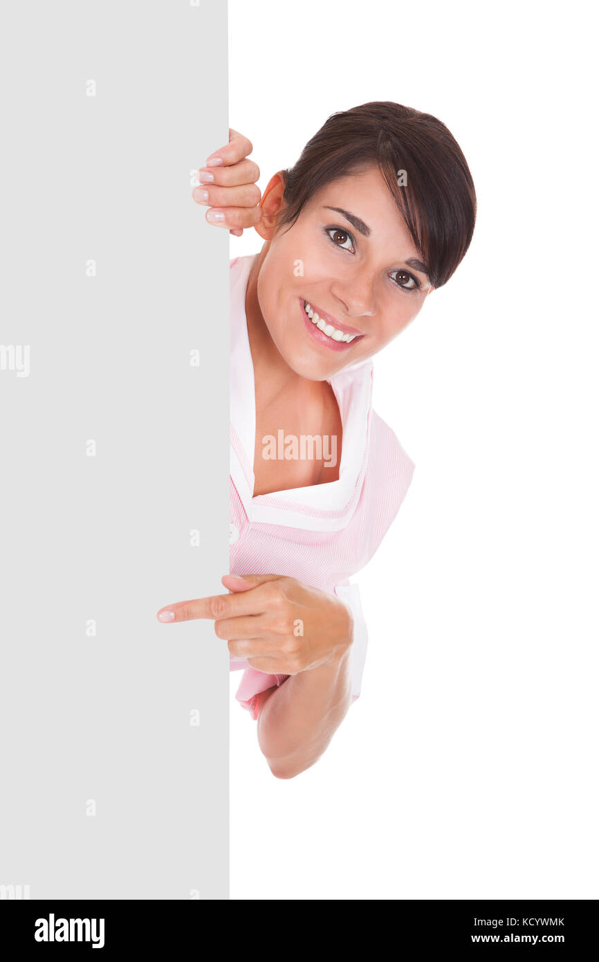 Young Happy Maid With Empty Bill Board Over White Background Stock Photo