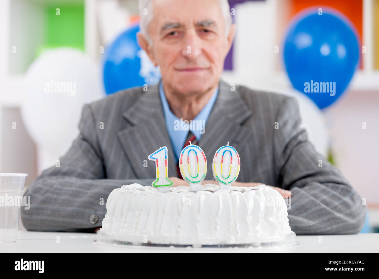 Senior man with cake on  one hundredth birthday Stock Photo