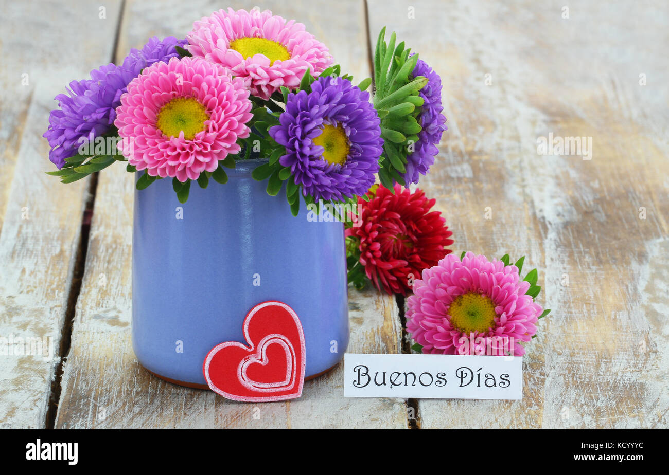 Buenos Dias (good morning in Spanish) with colorful daisy bouquet in