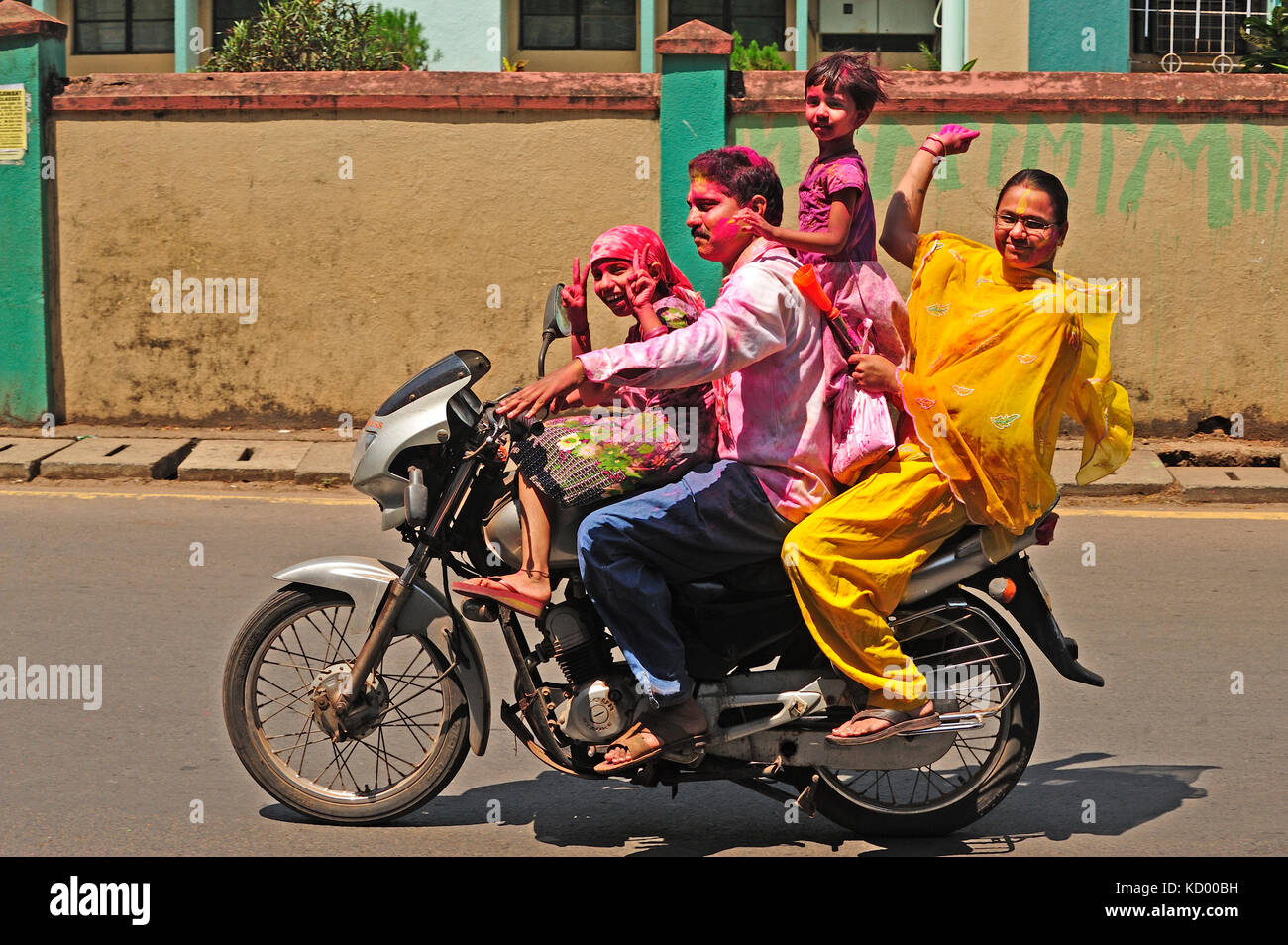 family on a motor scooter, Holi Festival, Panjim or Panaji, Goa, India  Stock Photo - Alamy