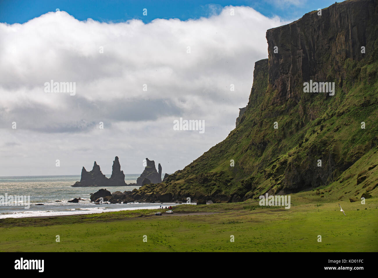 Reynisdrangar, basalt sea stacks situated under the mountain Reynisfjall near the village Vík in southern Iceland, Europe Stock Photo