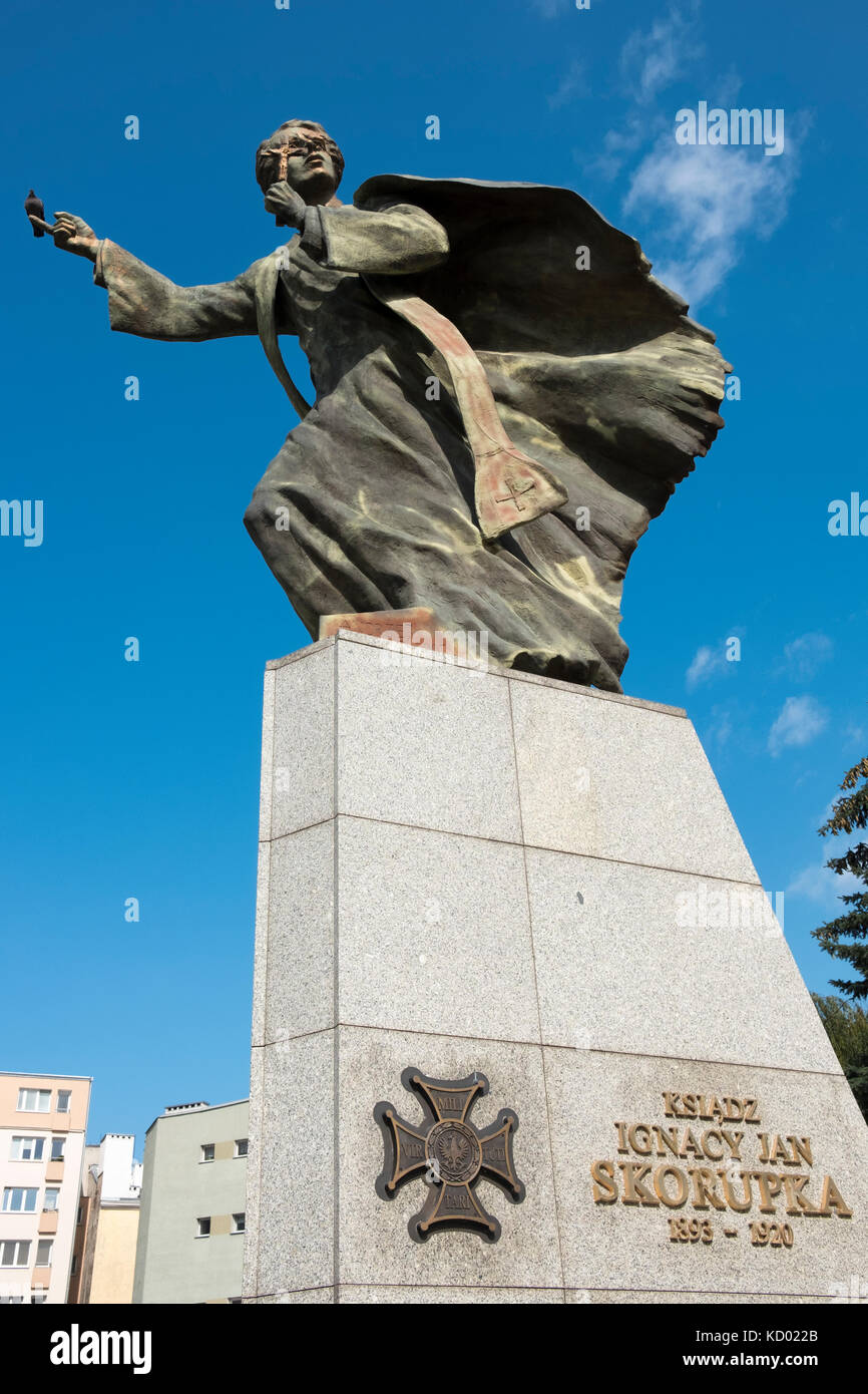 The statue of Father Ignacy Skorupka, in the Praga district of Warsaw, Poland. Stock Photo