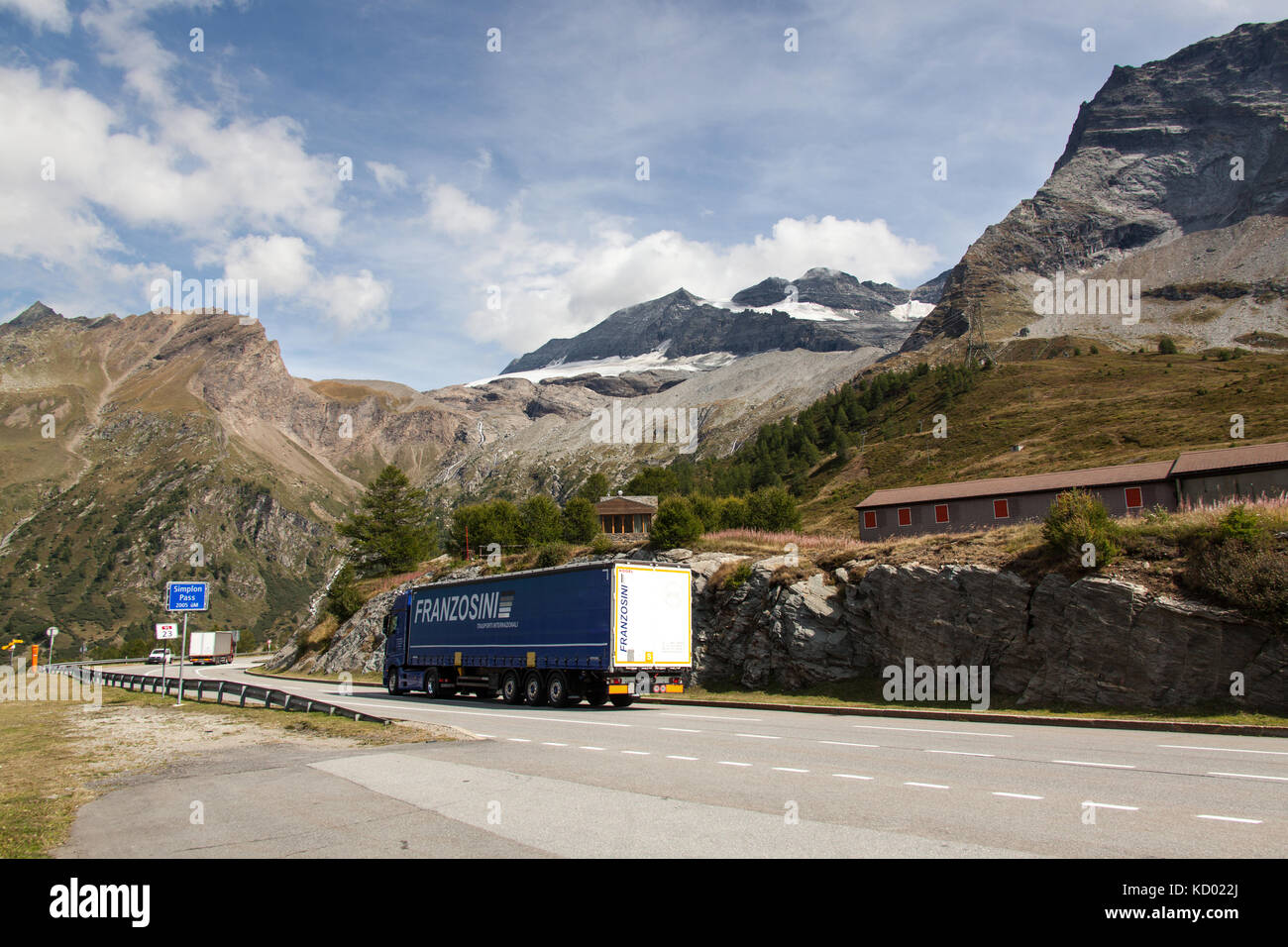 Simplon Pass, Switzerland. Picturesque view of traffic on the E62 at the summit of the Simplon Pass. Stock Photo