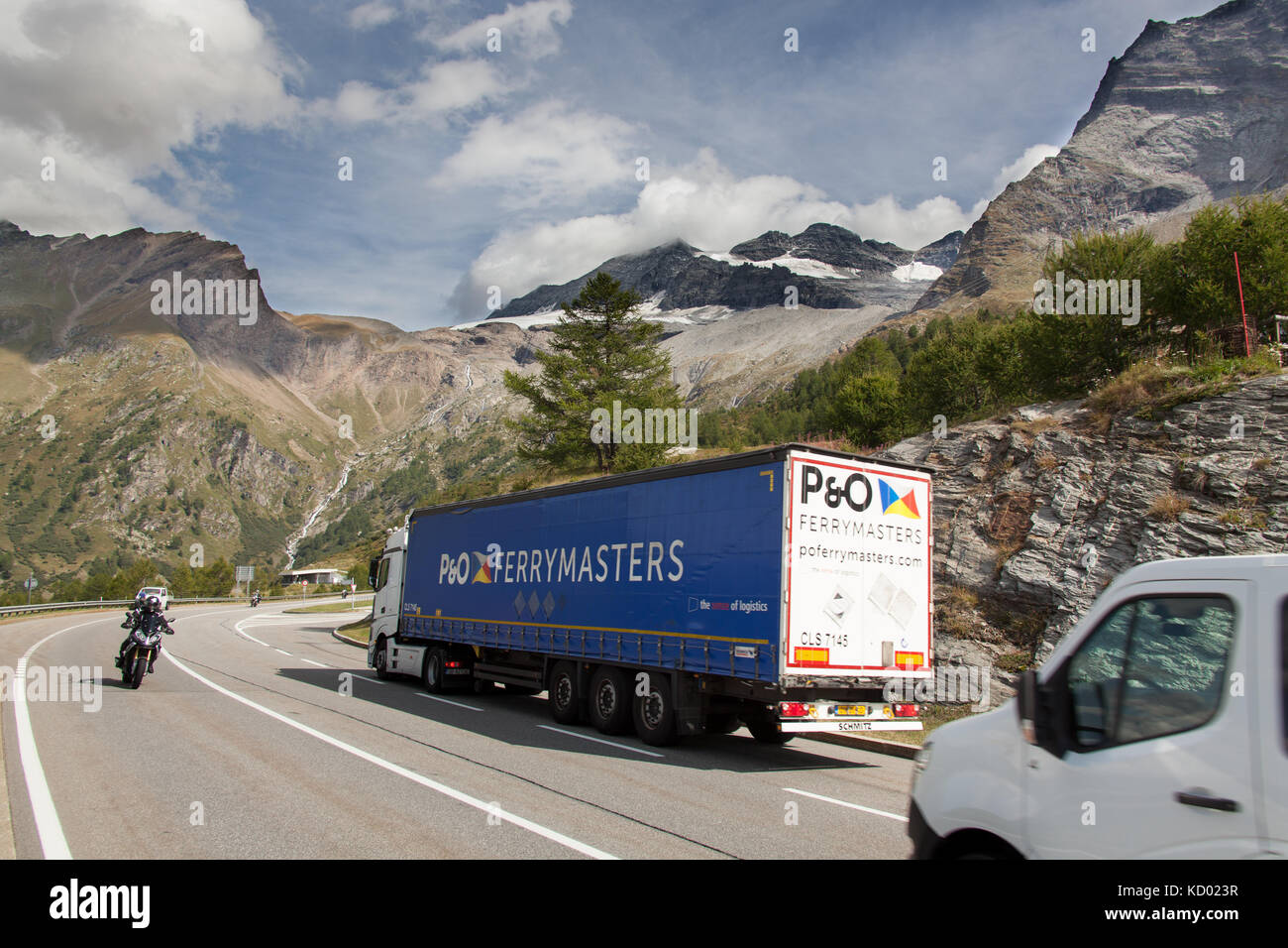 Simplon Pass, Switzerland. Picturesque view of traffic on the E62 at the summit of the Simplon Pass. Stock Photo