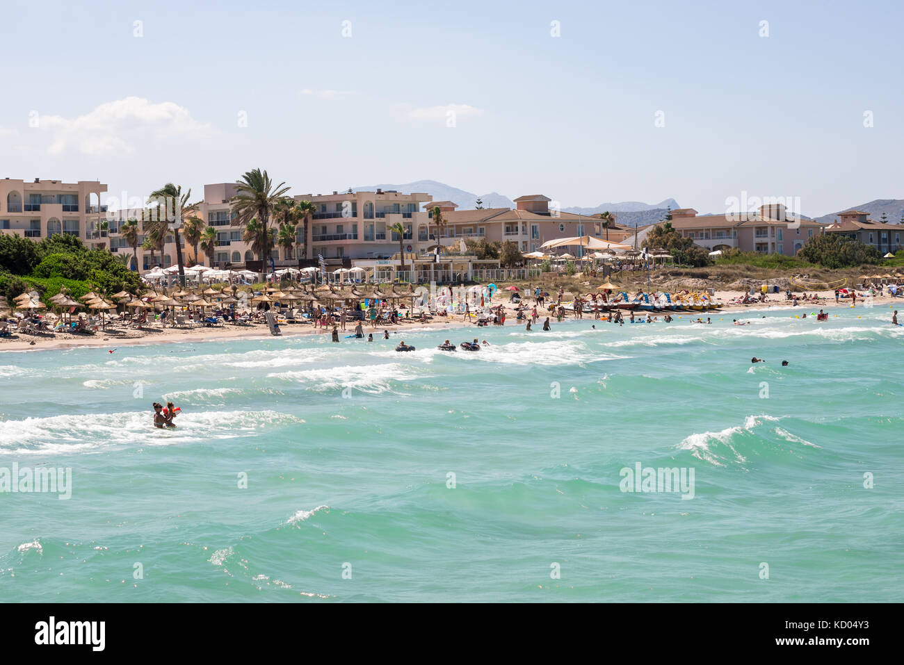 Tourists on holidays at Playa de Muro beach in Alcudia bay, Mallorca, Balearic islands Stock Photo