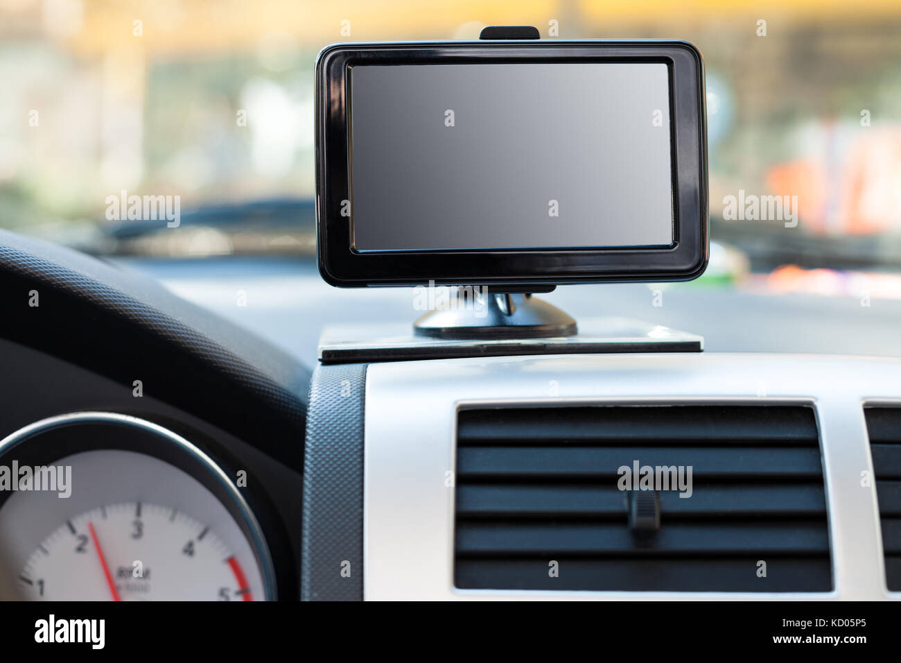 Satellite navigation system on windshield in car Stock Photo Alamy