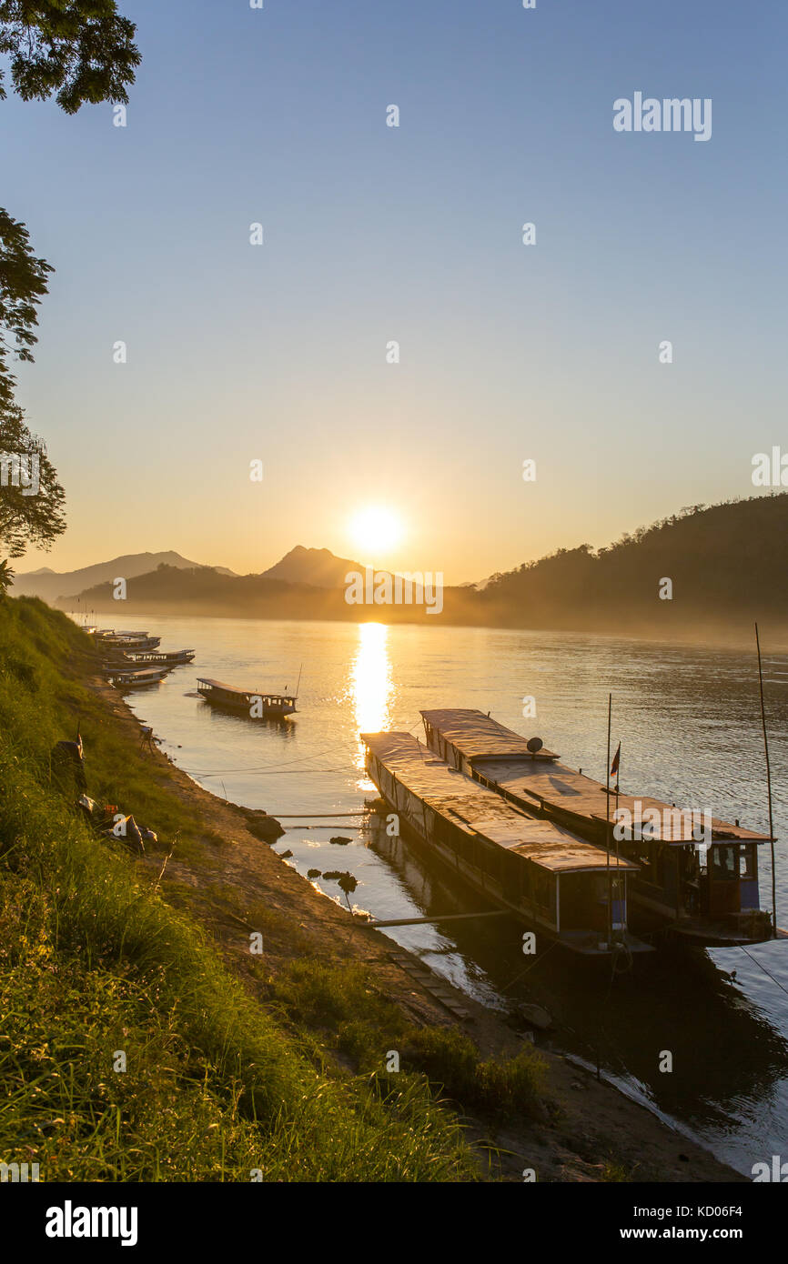 Boats on the Mekong river, Luang Prabang, Laos Stock Photo