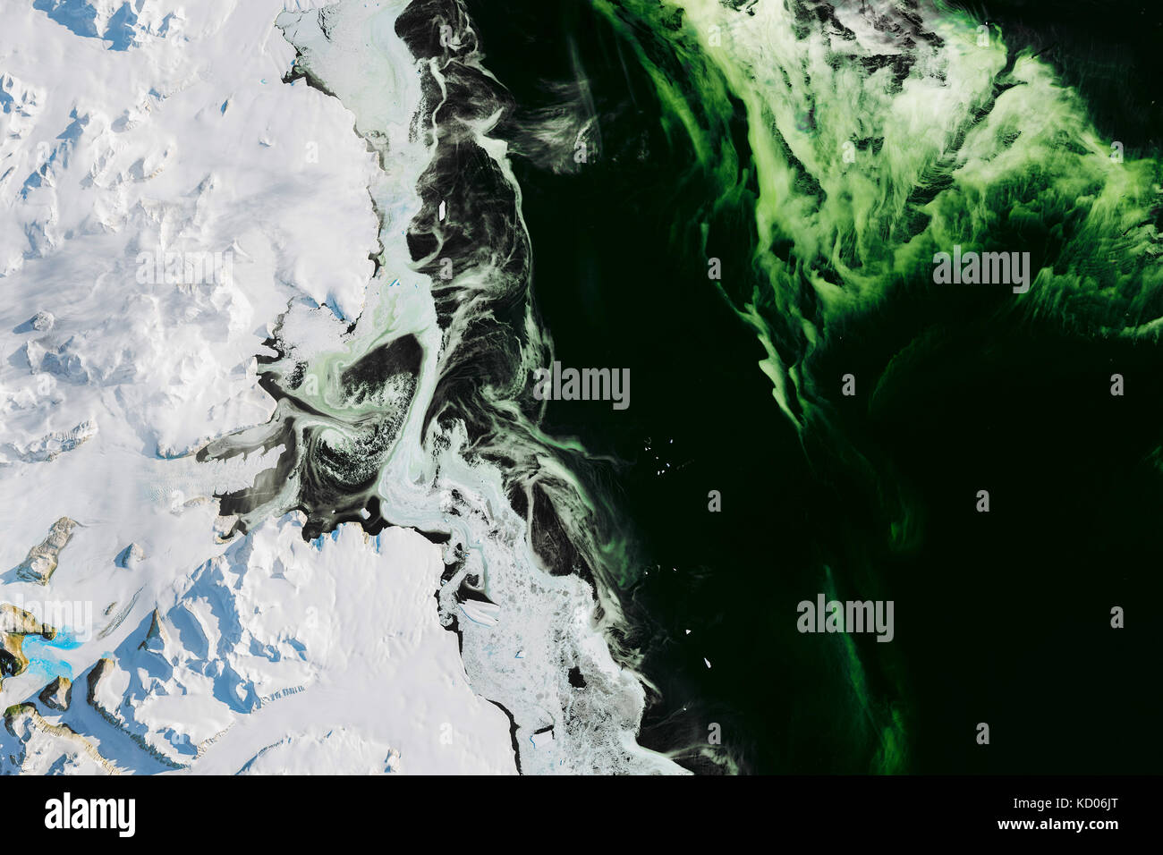 Satellite image of water, sea ice, and phytoplankton. The region pictured is Antarctica’s Granite Harbor—a cove in the vicinity of the Ross Sea. Stock Photo