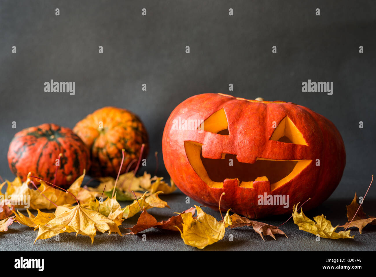 scary Halloween Pumpkin on a gray background Stock Photo