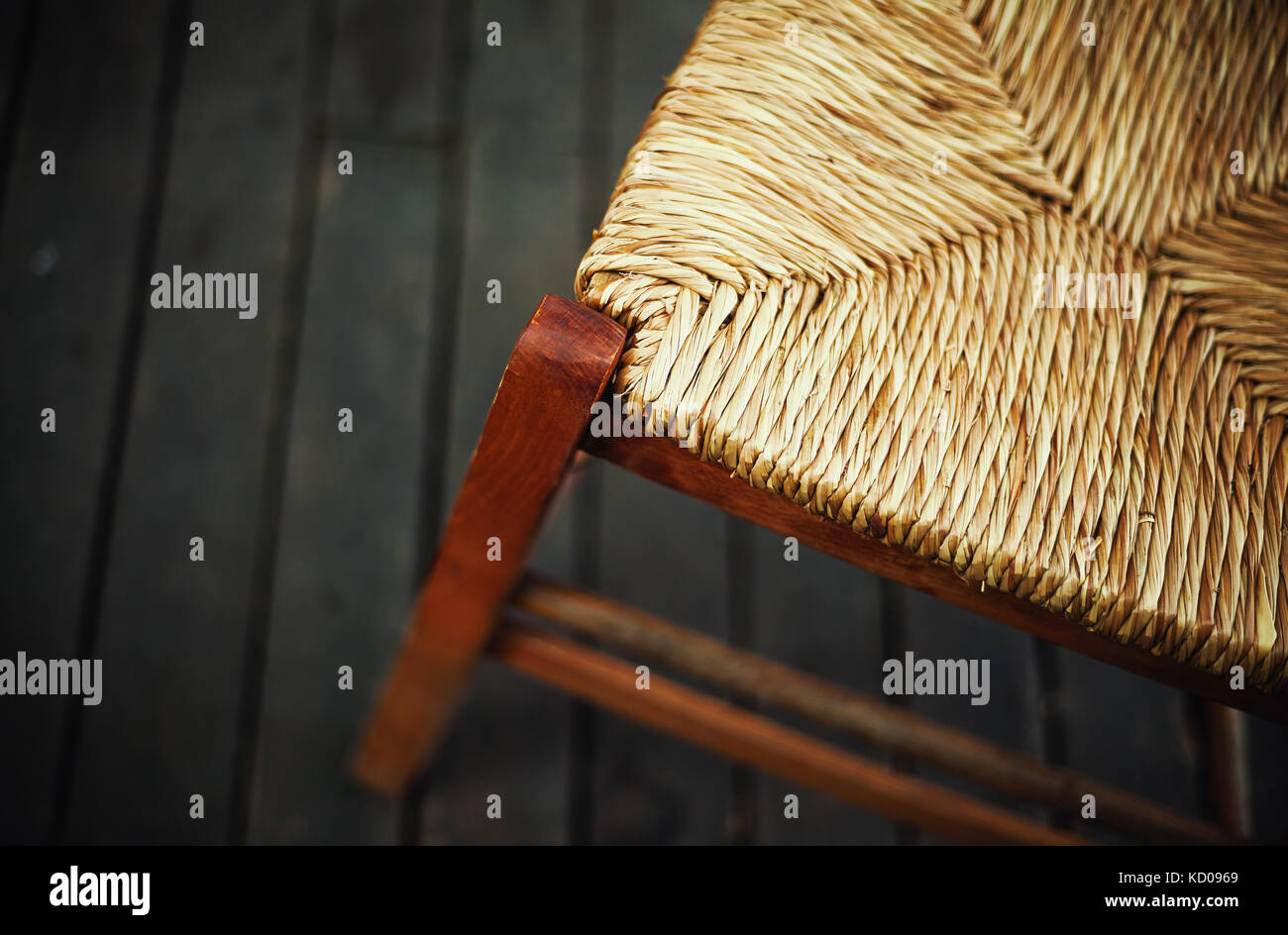 One part of chair made of wood and reed on wooden floor Stock Photo - Alamy