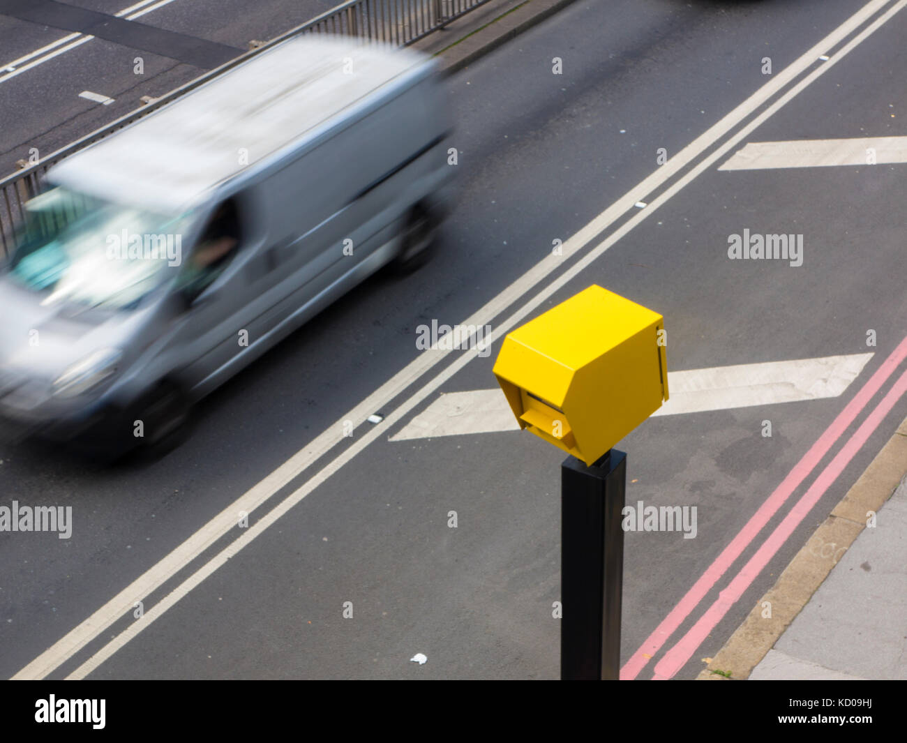 A car speeding through a speed trap in London Stock Photo