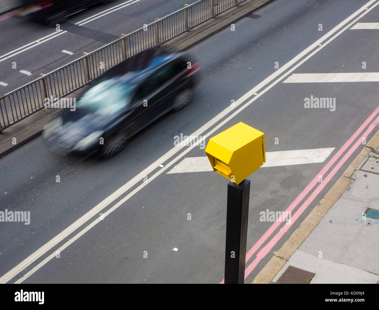 A car speeding through a speed trap in London Stock Photo