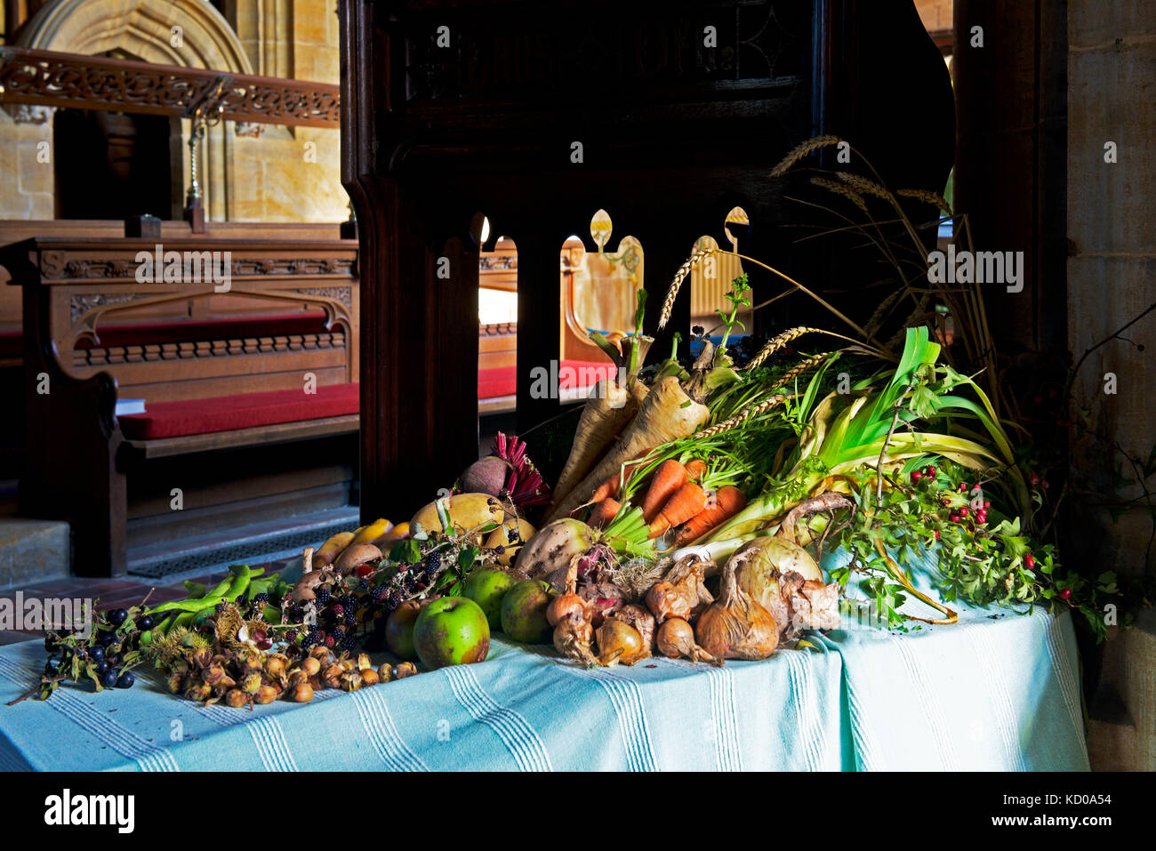 Display of fruit and vegetables, harvest festival,All Saints Church, Evershot, Dorset, England UK Stock Photo