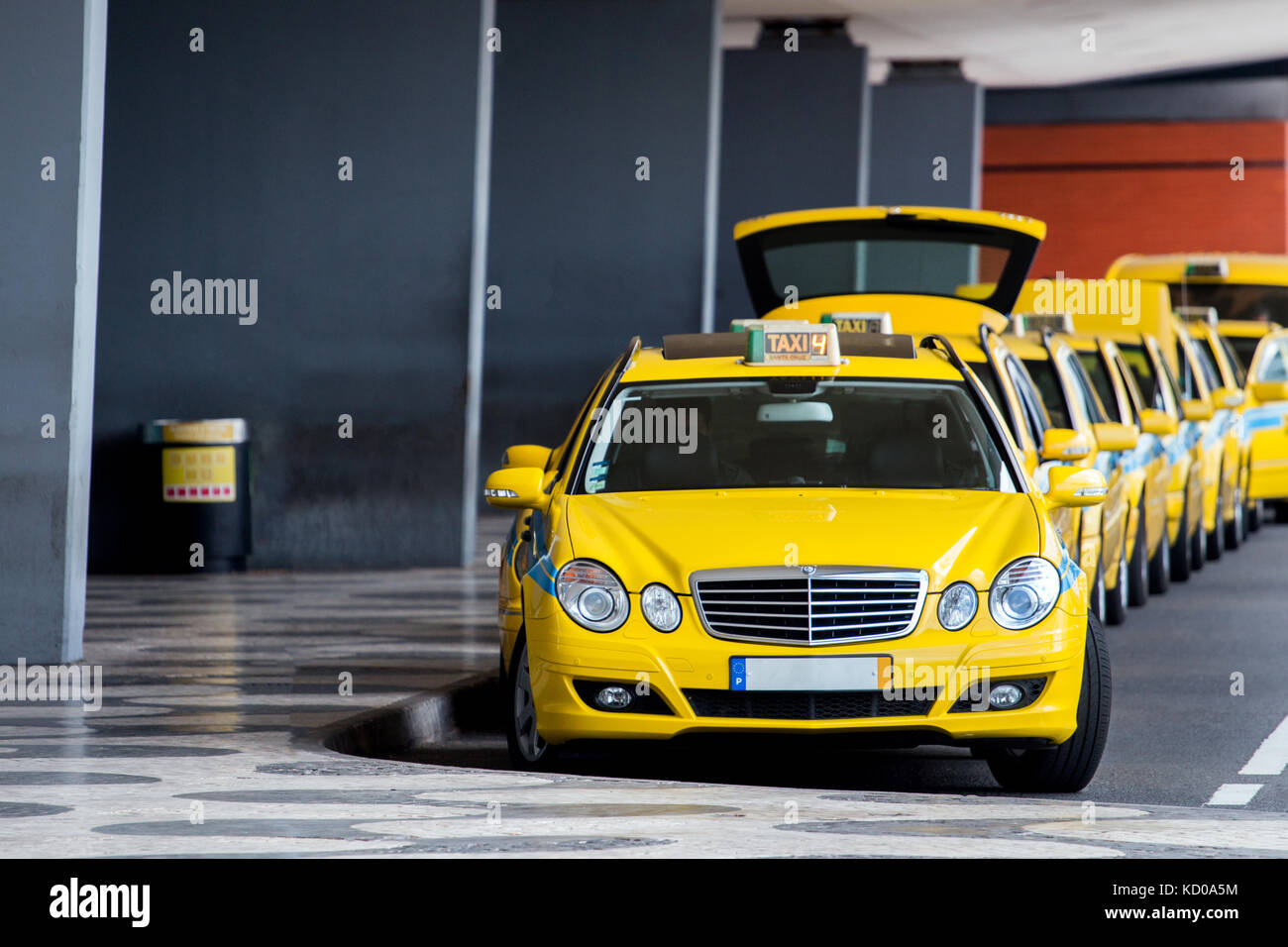 Row of Yellow taxis in Madeira island Stock Photo Alamy