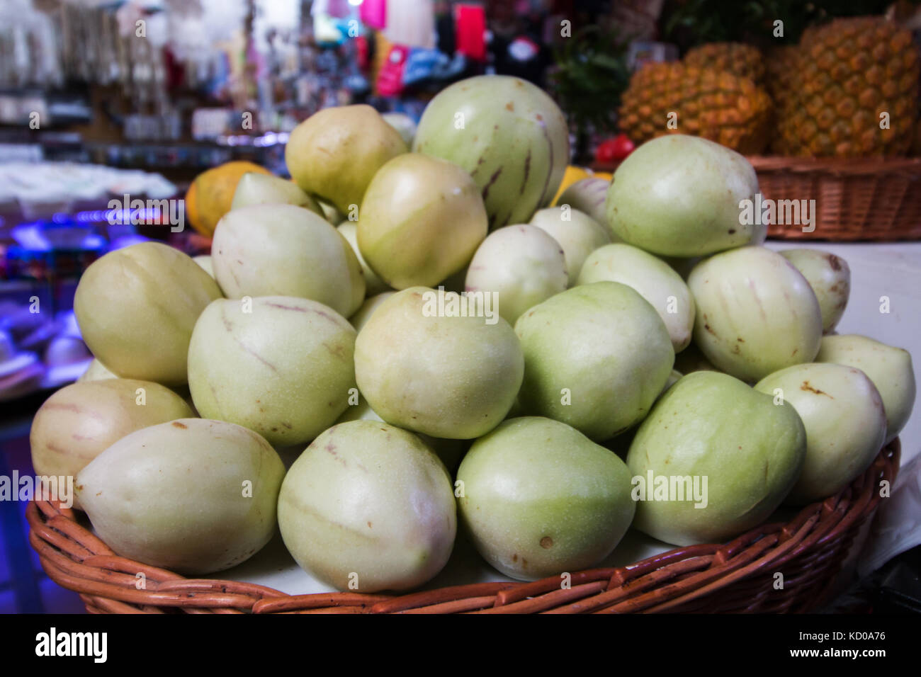 Exotic umbu fruit at sale on the market. Stock Photo