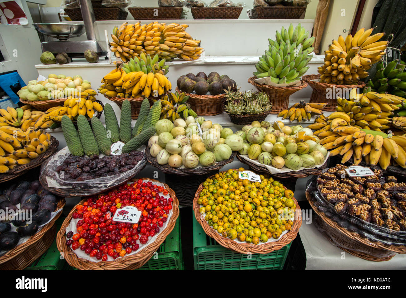 Variety of exotic fruits at sale on the market. Stock Photo