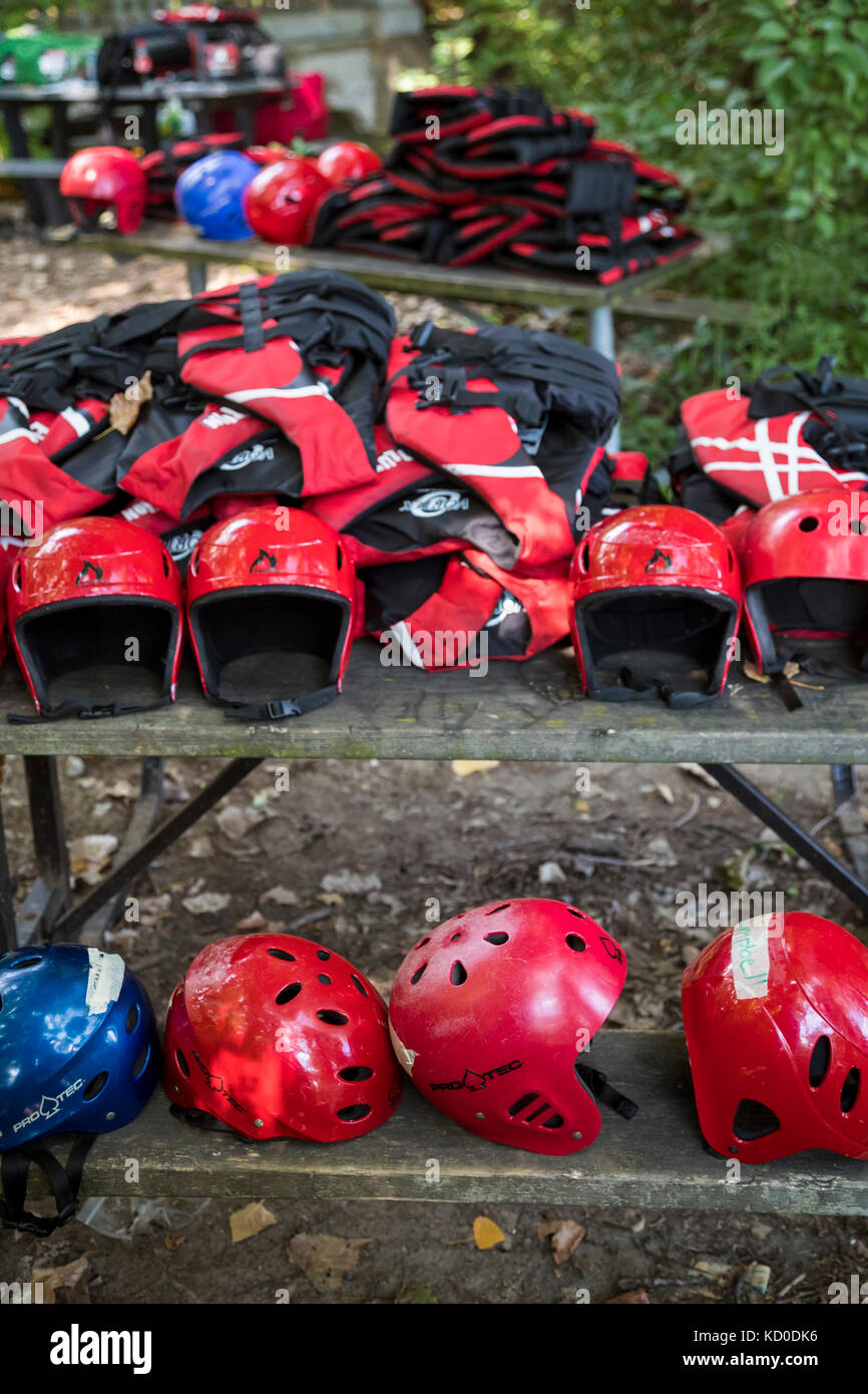 Windsor, Ontario Canada - Helmets and life jackets for kayakers on Peche Island, an island city park in the Detroit River. Stock Photo