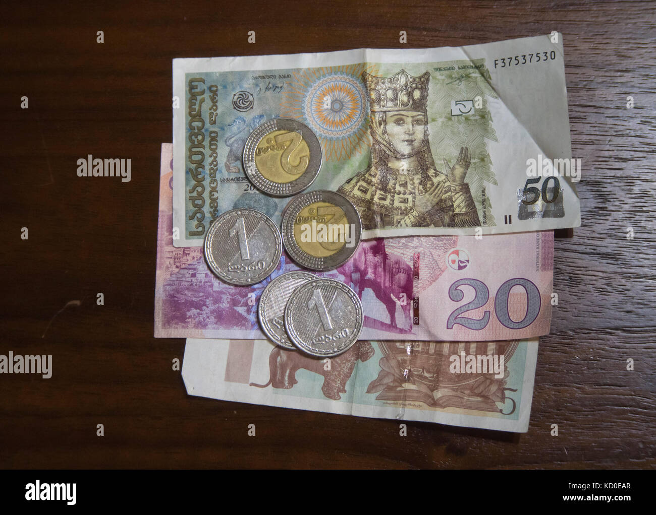 Georgian lari banknotes and coins on tabletop Stock Photo