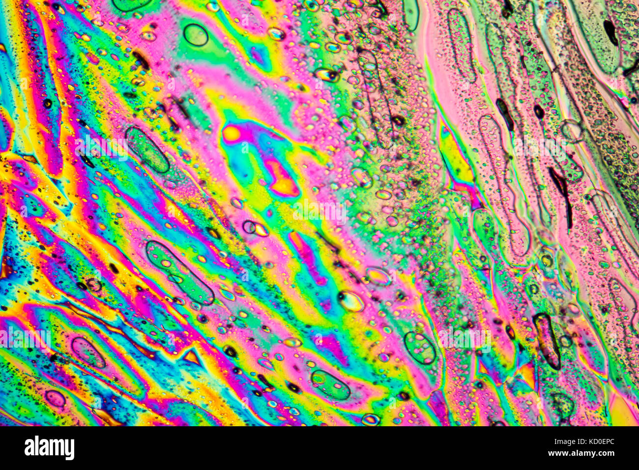 colorful microscopic shot of Sodium acetate micro crystals in polarized ...