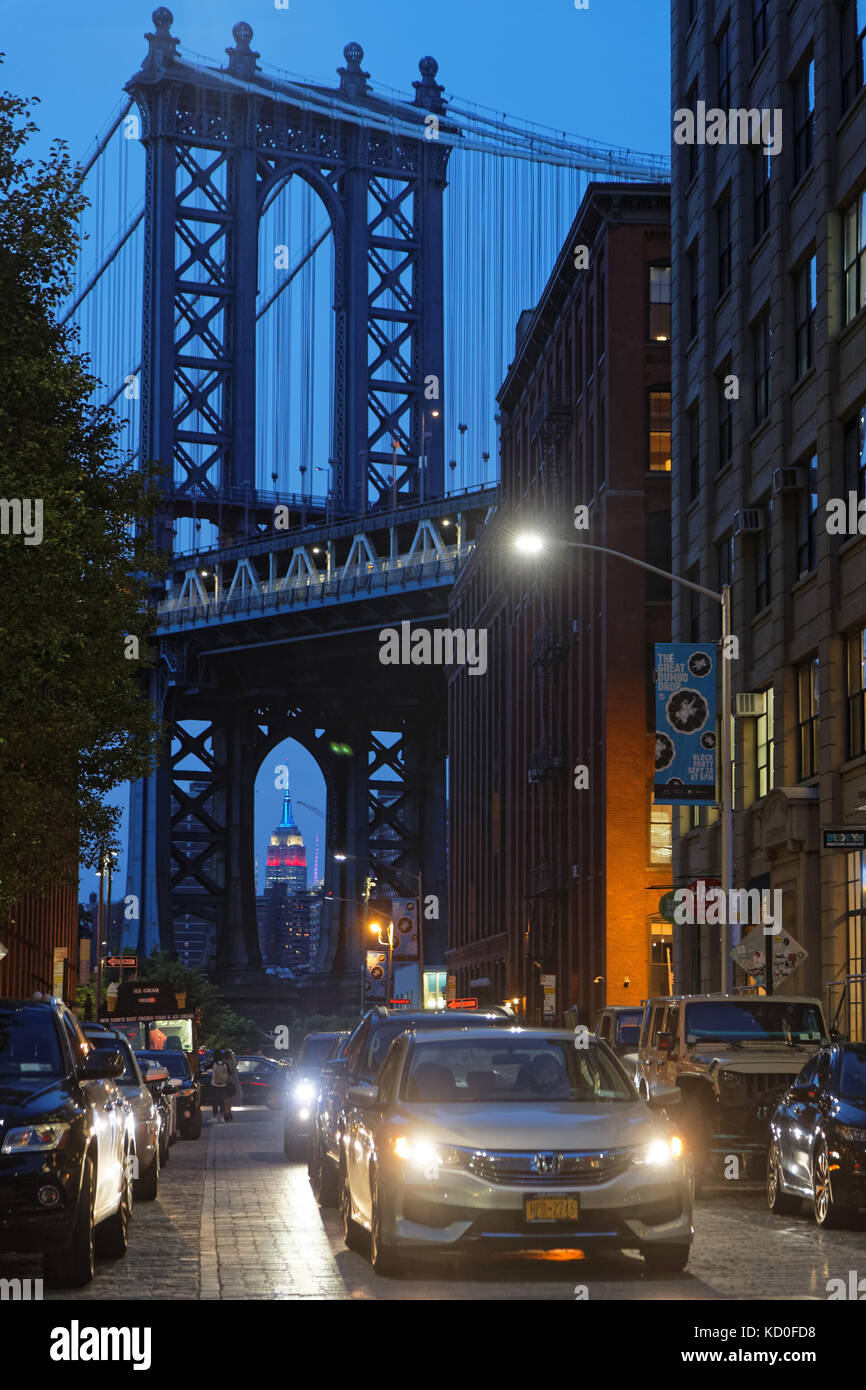 NEW YORK CITY, USA, September 11, 2017 : The Manhattan Bridge and Brooklyn streets at night.  Connecting Manhattan and Brooklyn, Manhattan Bridge is o Stock Photo