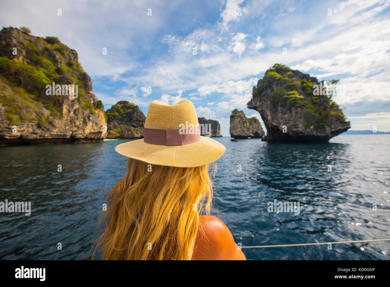 Rear view of woman looking away at view, Koh Li Ma, Thailand, Asia Stock Photo