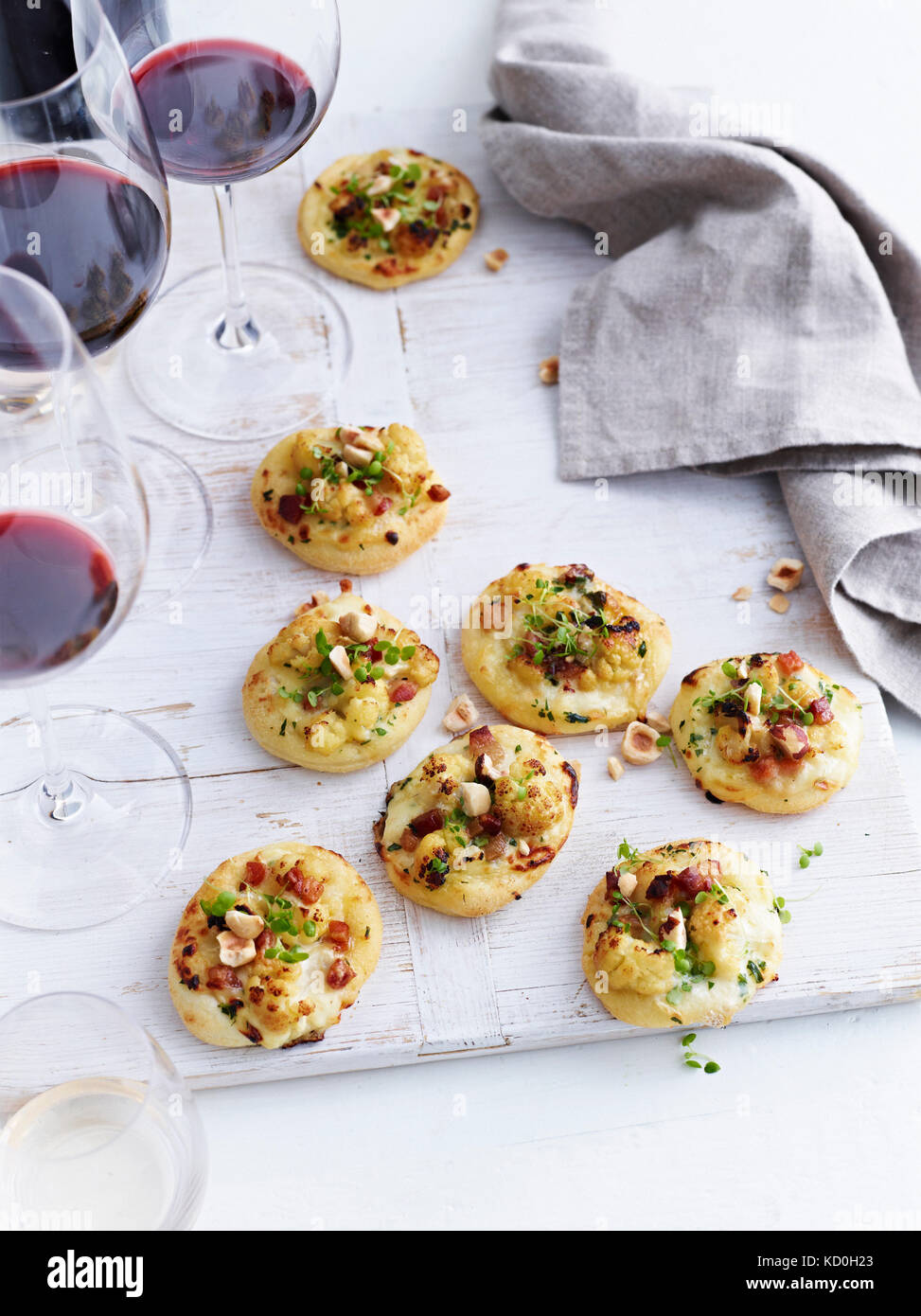 Mini pizzas topped with roasted cauliflower and gorgonzola, elevated view Stock Photo