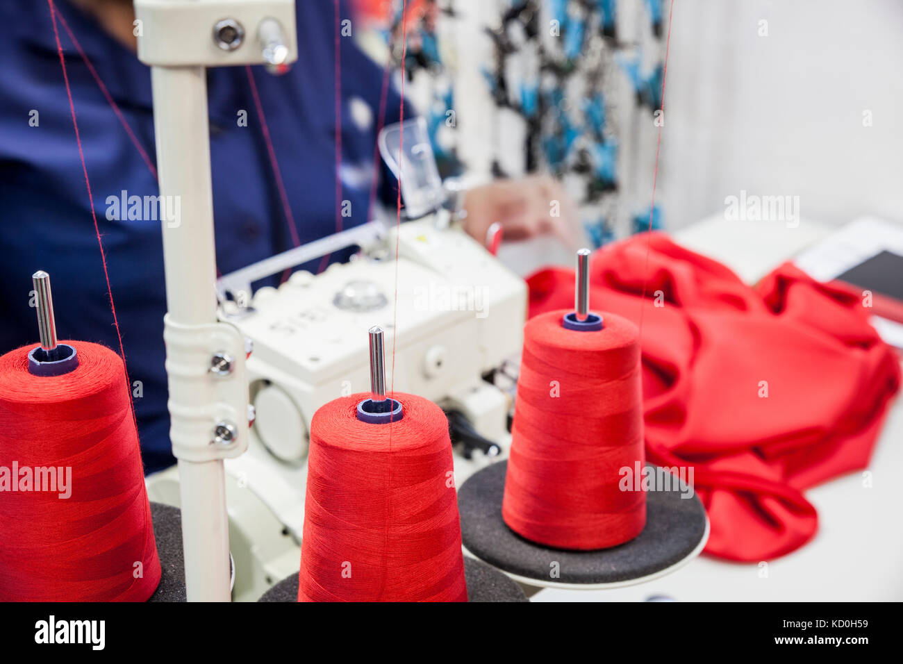 Seamstress working on overlocker in factory, Cape Town, South Africa Stock Photo