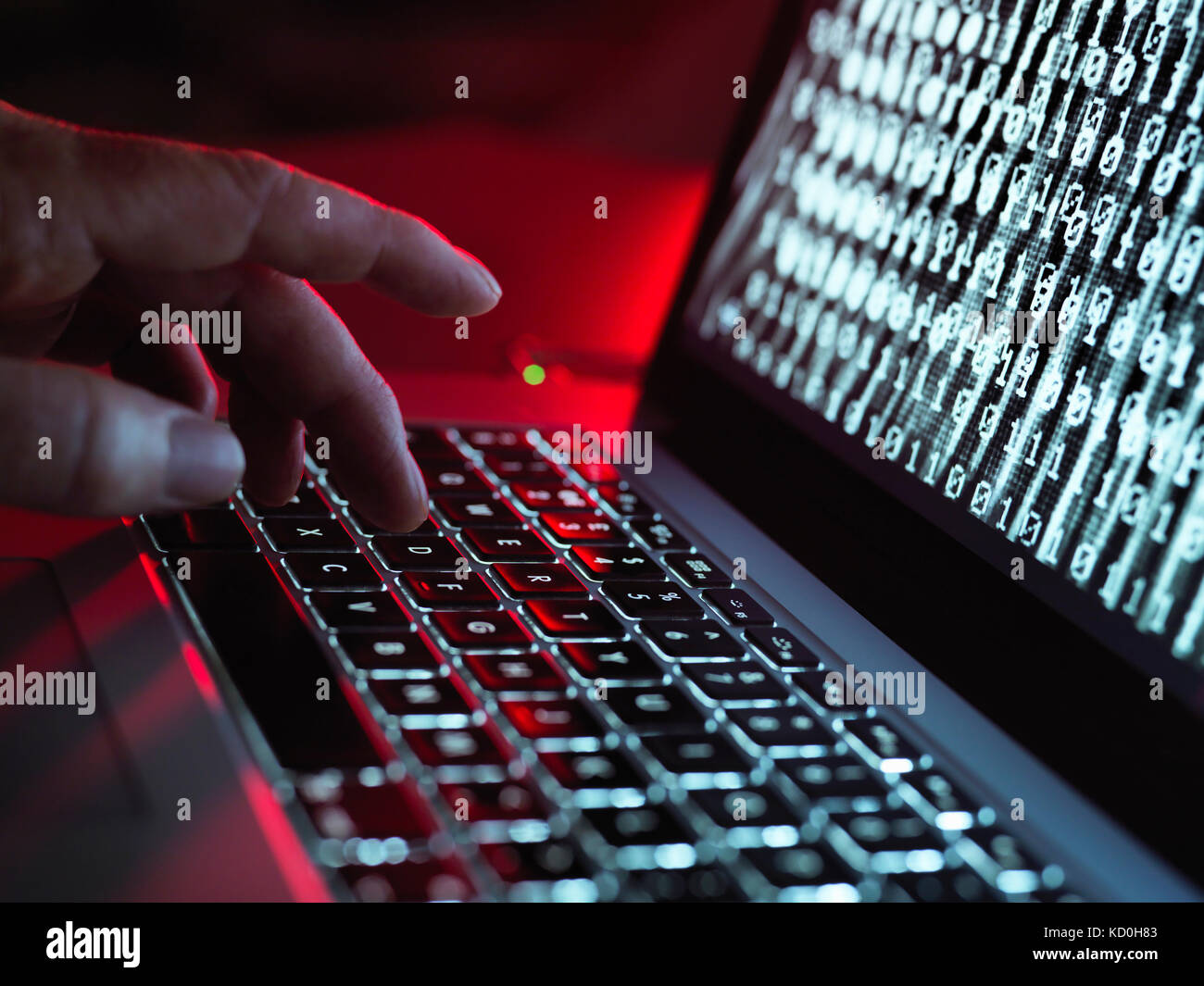 Laptop computer being infected by a virus Stock Photo