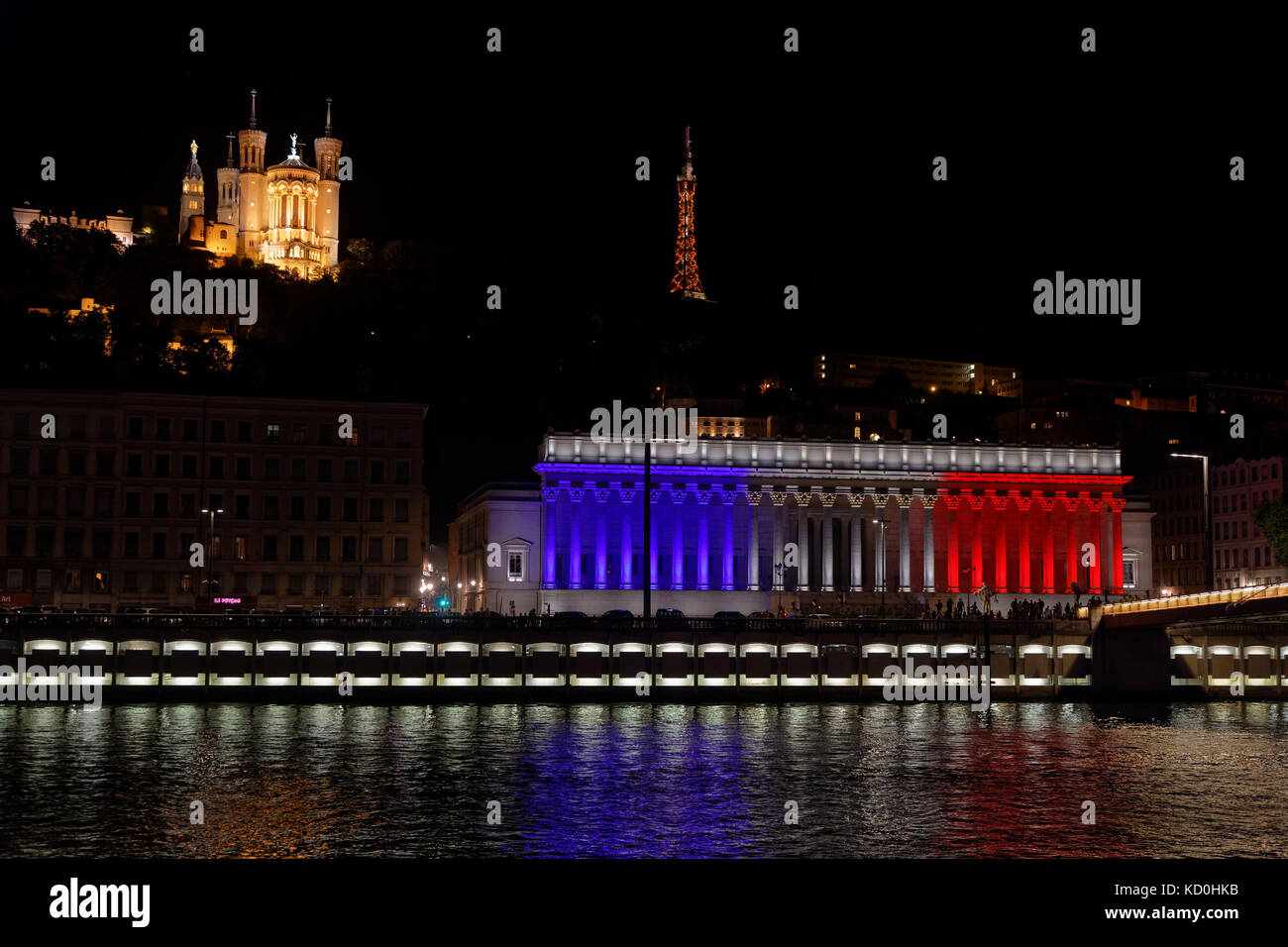 LYON, FRANCE, July 14, 2017 : The city of Lyon commemorates Bastille Day (French National Day) by a lightning of french colors on Palais de Justice, w Stock Photo